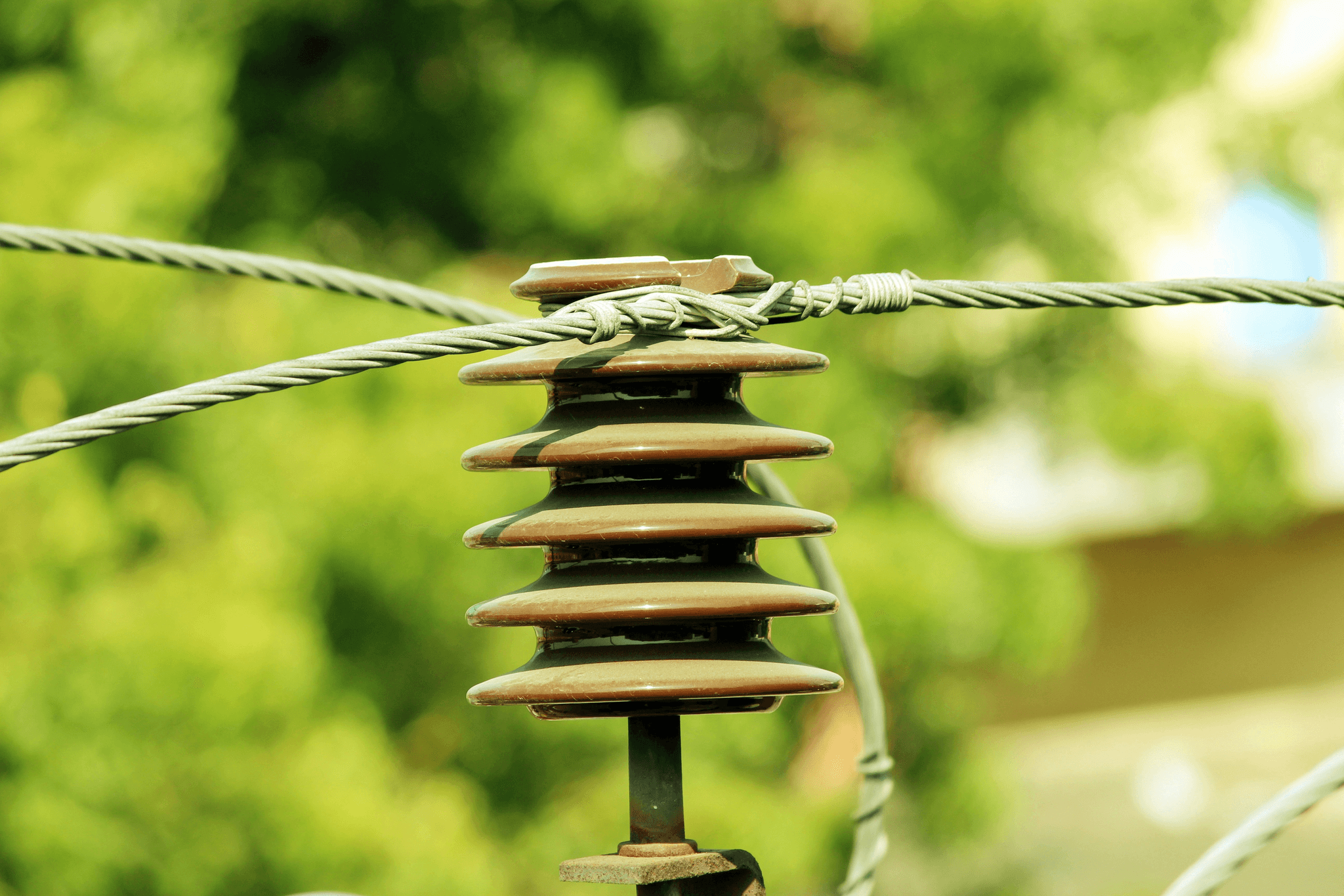 Power pole parts in organized warehouse.