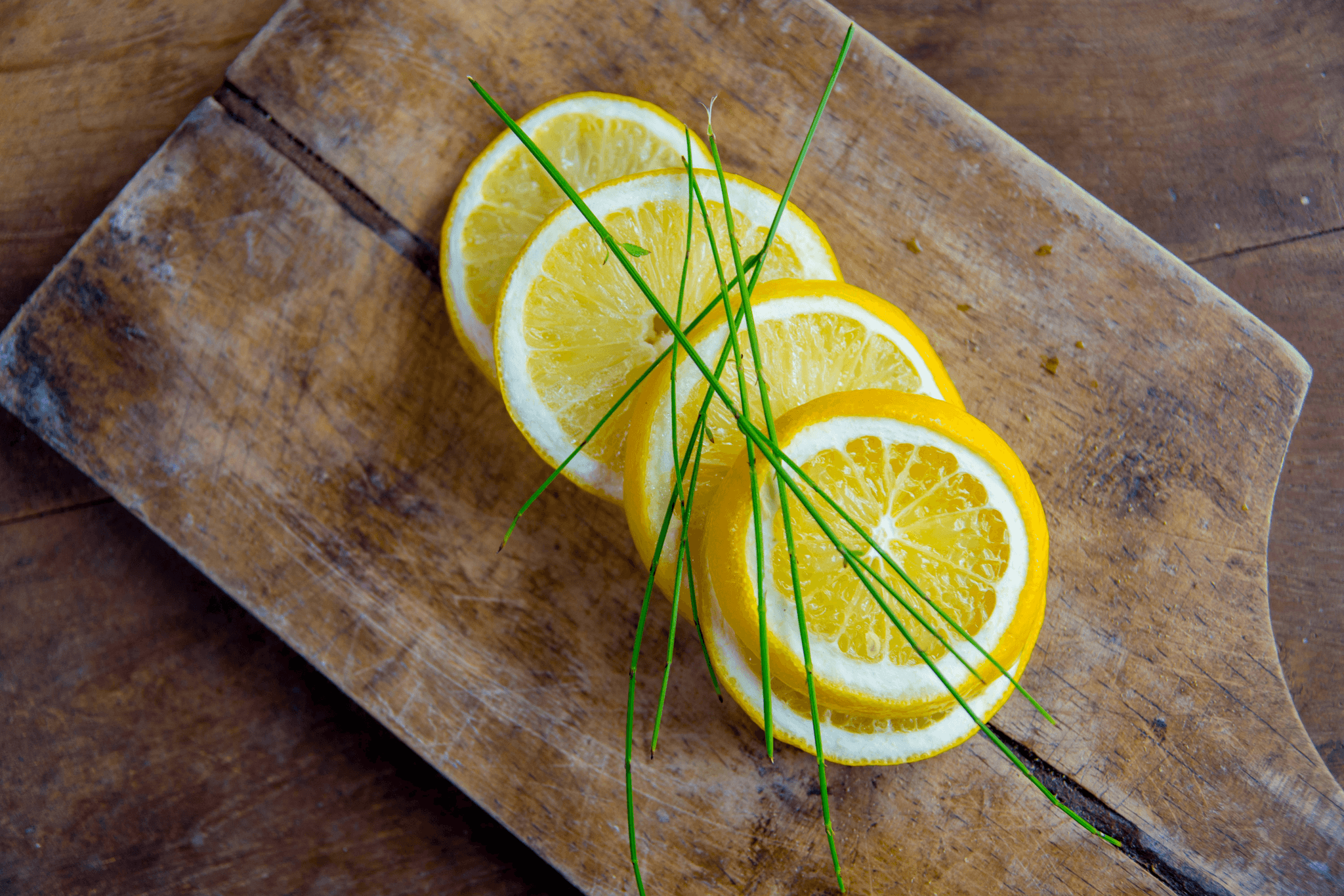 freshly prepared freeze dried lemon slices on cutting board