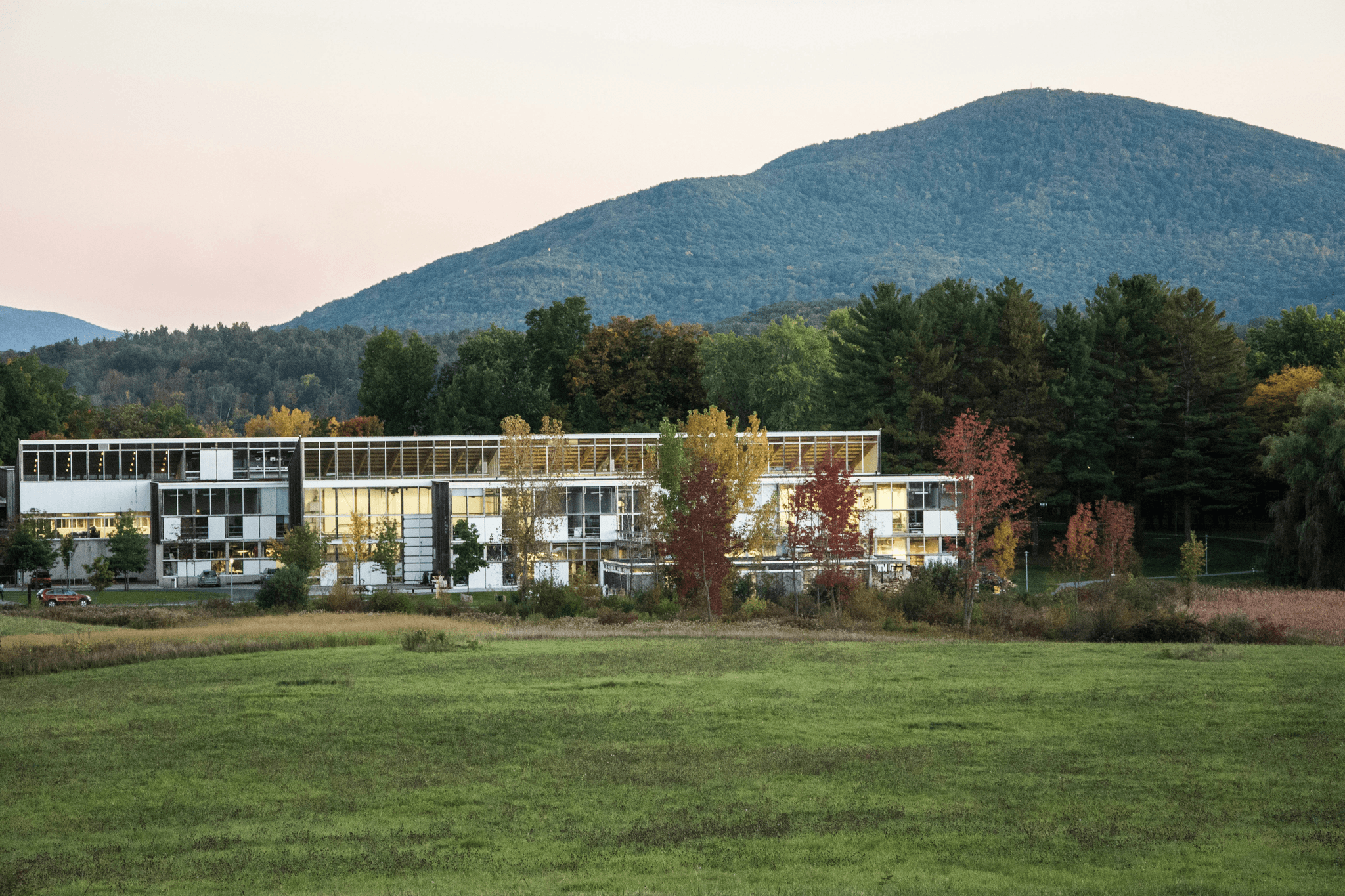 Eco-friendly prefab classroom surrounded by greenery
