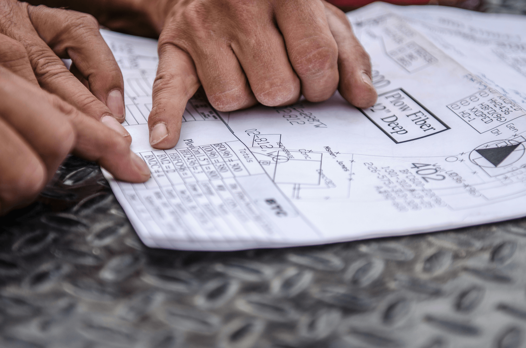 Prefab container contractor discussing plans with client