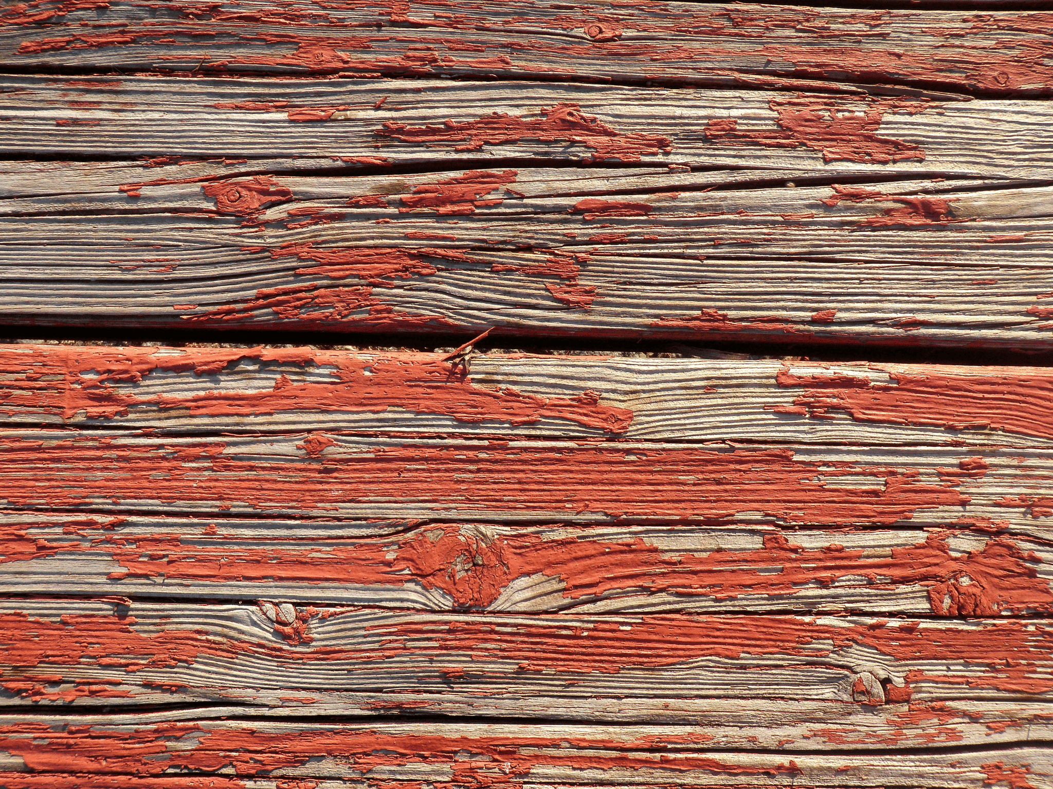 re decking evaluation with weathered wood and peeling paint