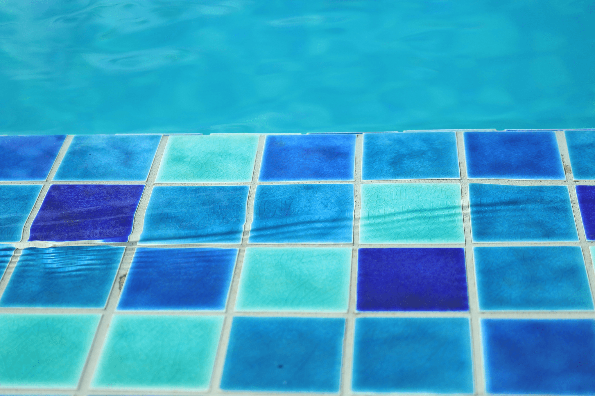 Pool tile ideas with vibrant blue recycled glass tiles