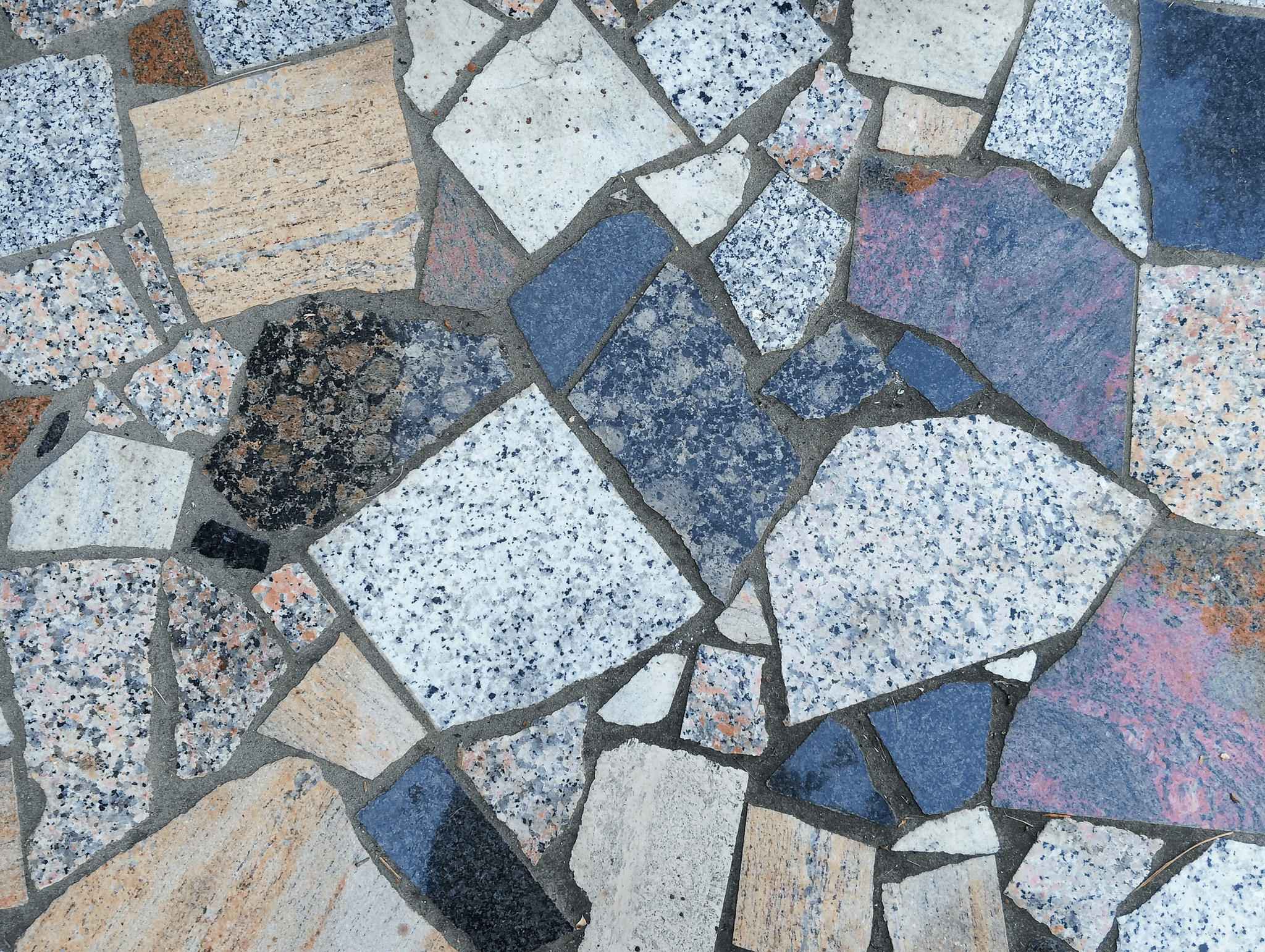 Different types of tile floors showcased in various natural stone tile options