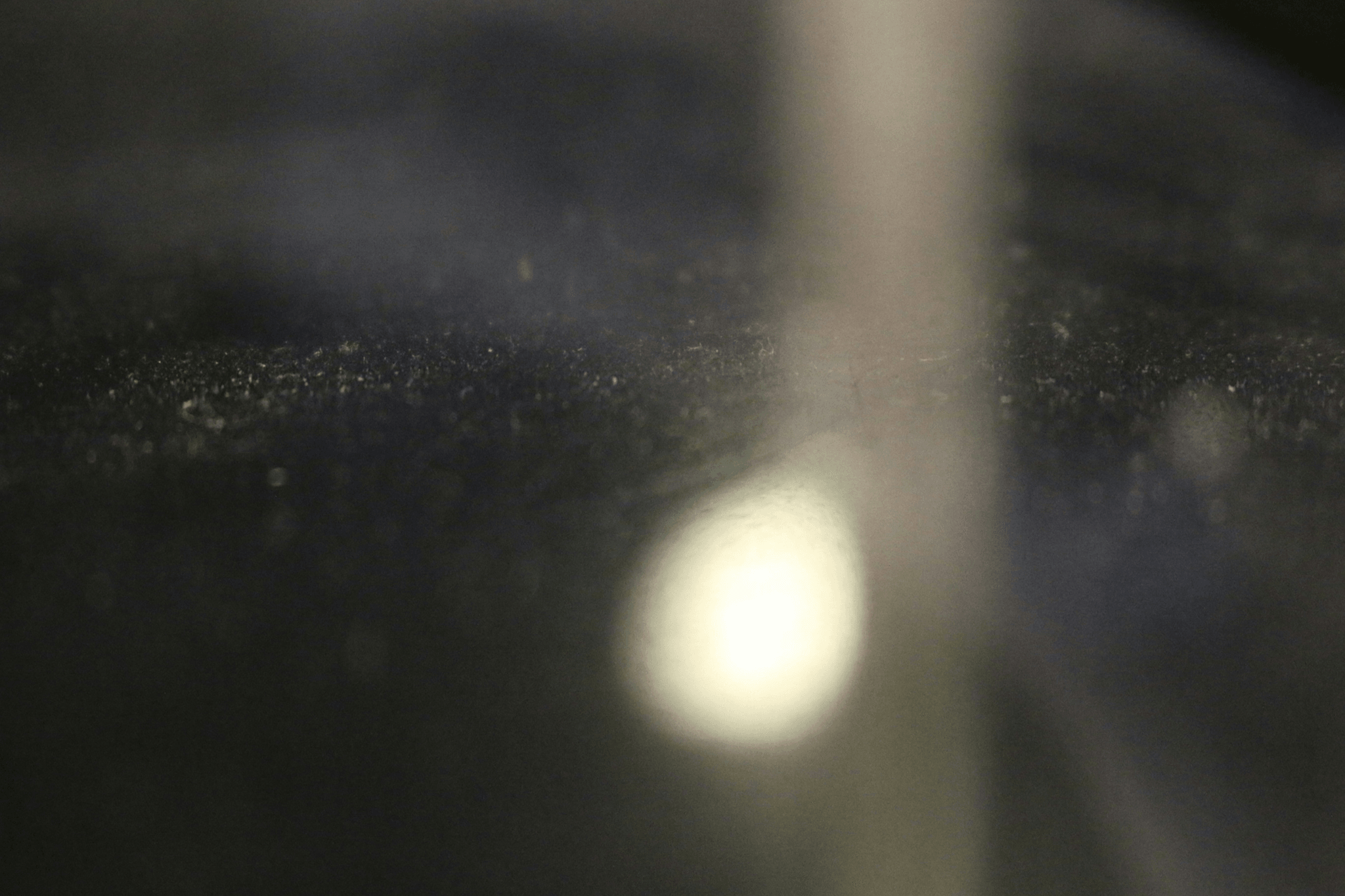 Inspector analyzing major and minor scratch marks on product surfaces