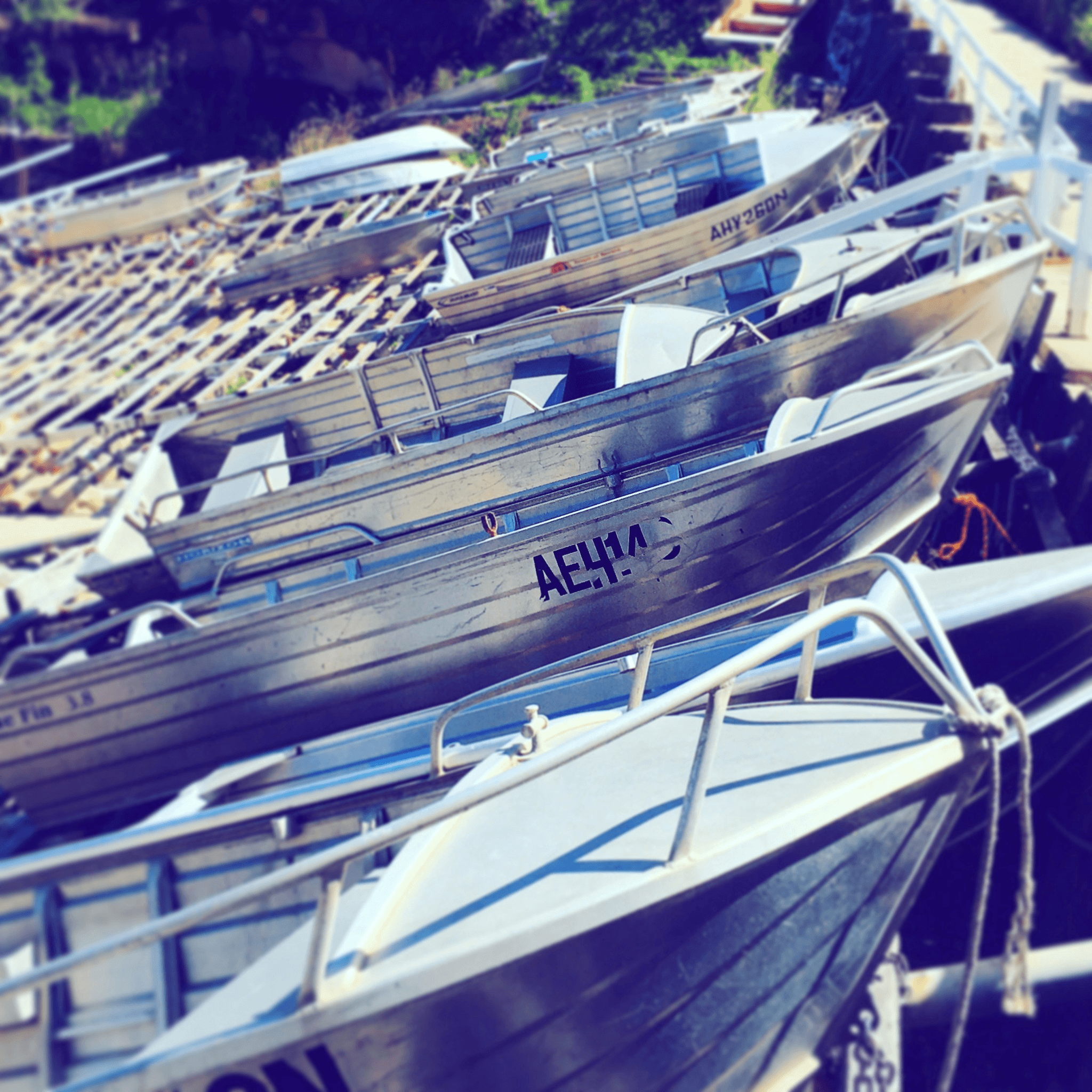 best aluminum bass boat for the money displayed at dock