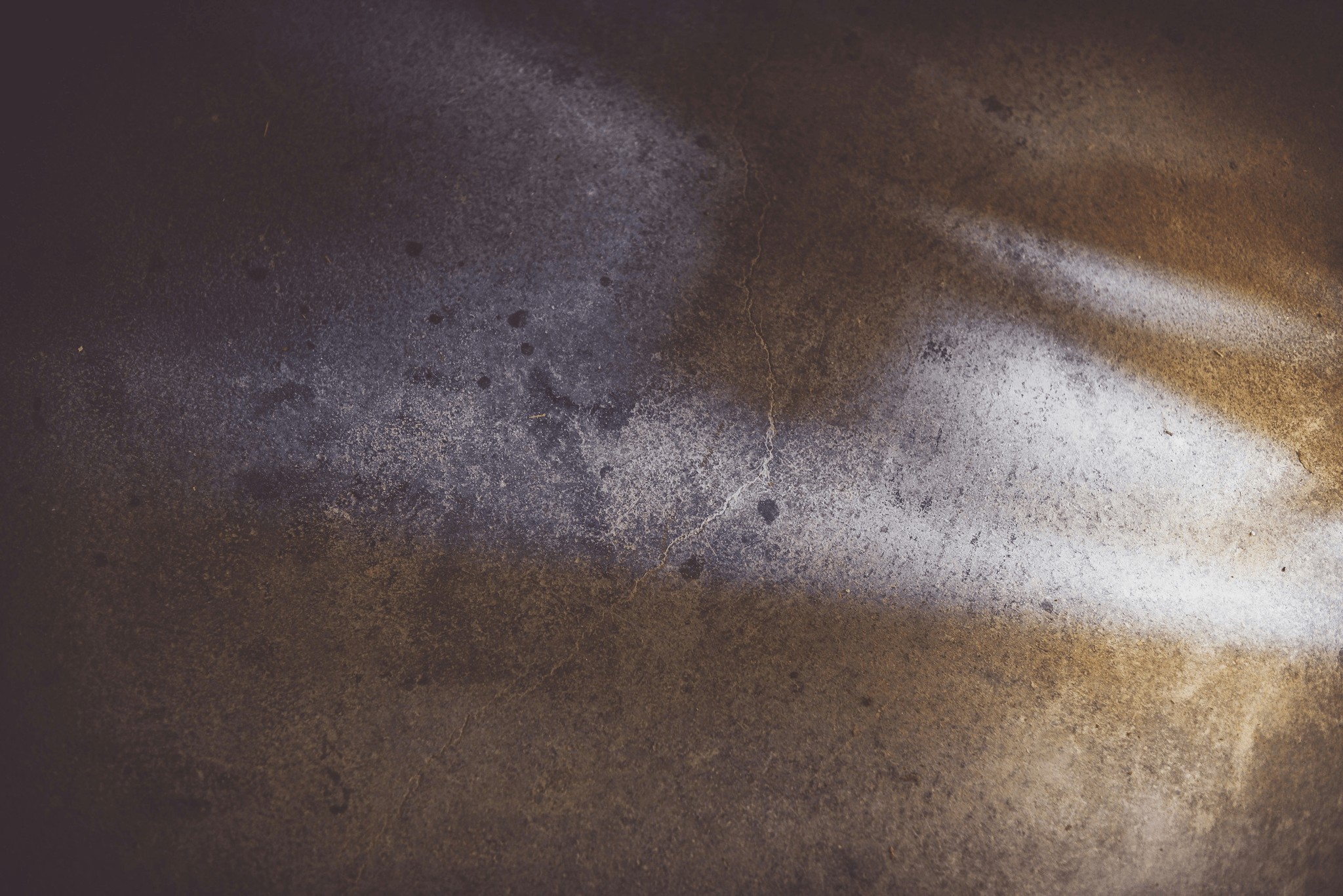 Metal surface inspected with fluorescent dye under UV light.