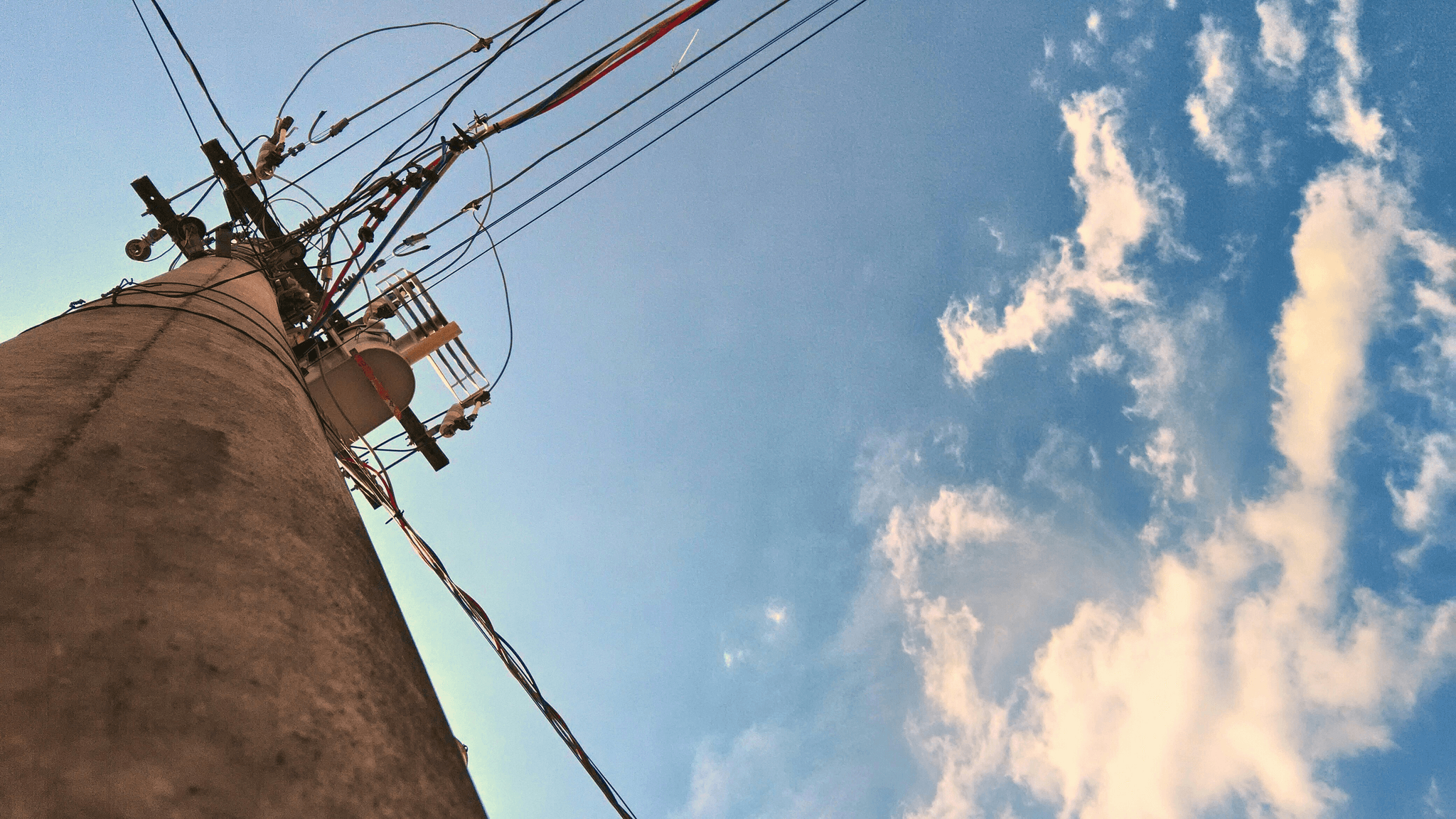 Innovative opgw suspension clamp securing multiple optical fibers.