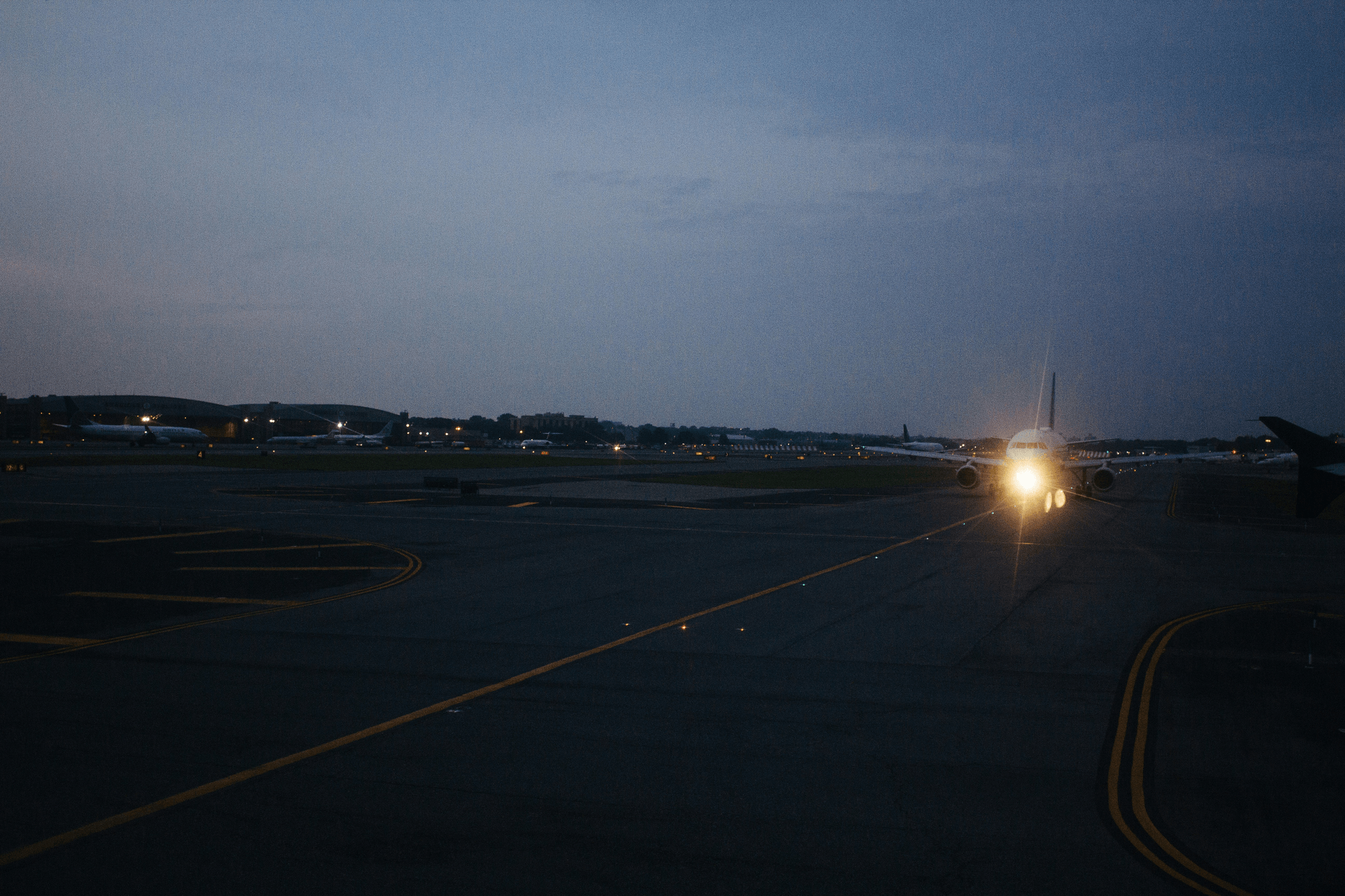 Illuminated runway at night adhering to FAA runway lighting requirements