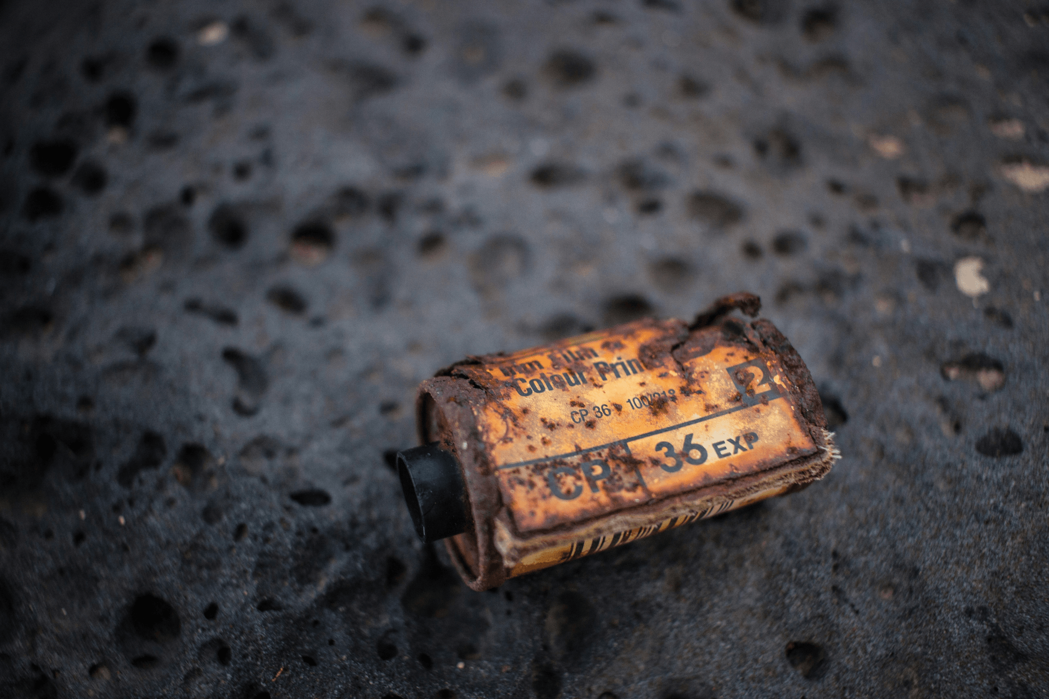 Battery charger showing cracks, corrosion, and burnt marks for inspection