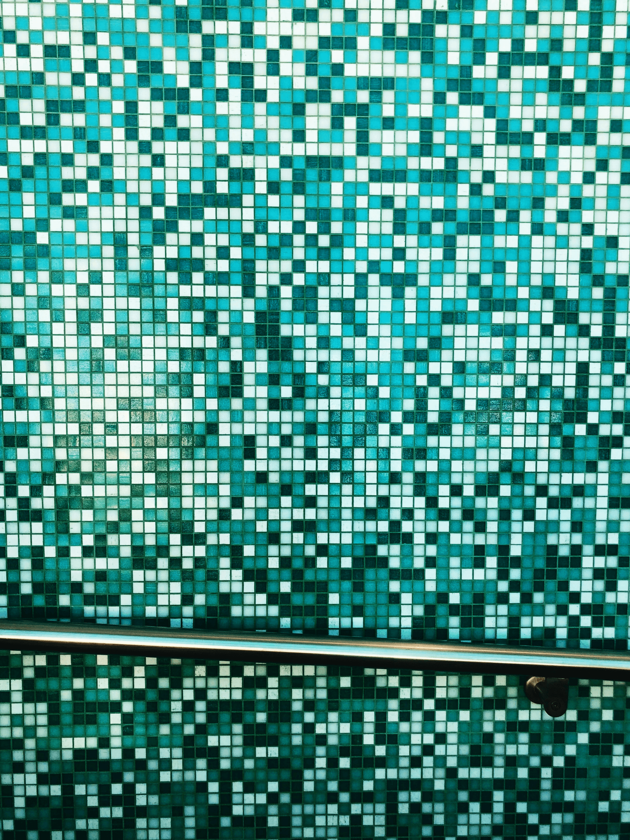 Modern glass mosaic shower tile in contemporary space