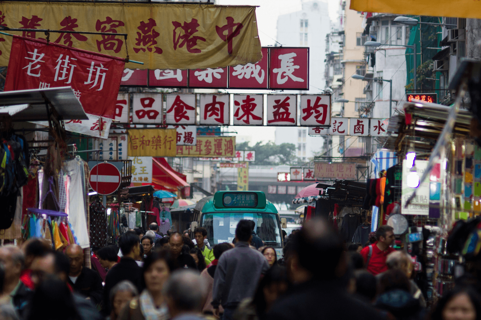 Shoppers enjoying vibrant atmosphere at guangzhou market