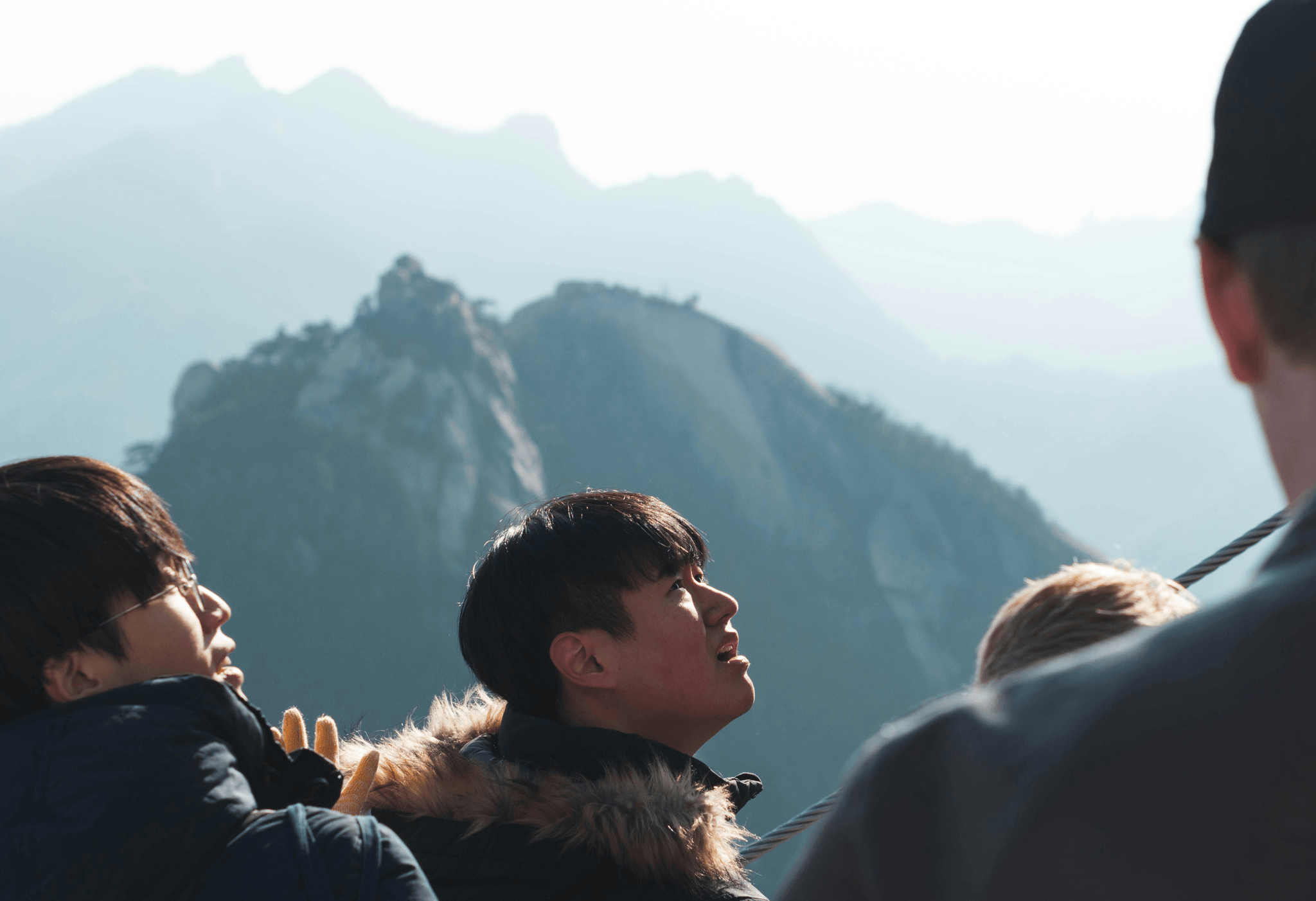 Group of tourists enjoying an adventurous hike in breathtaking Tibetan landscapes