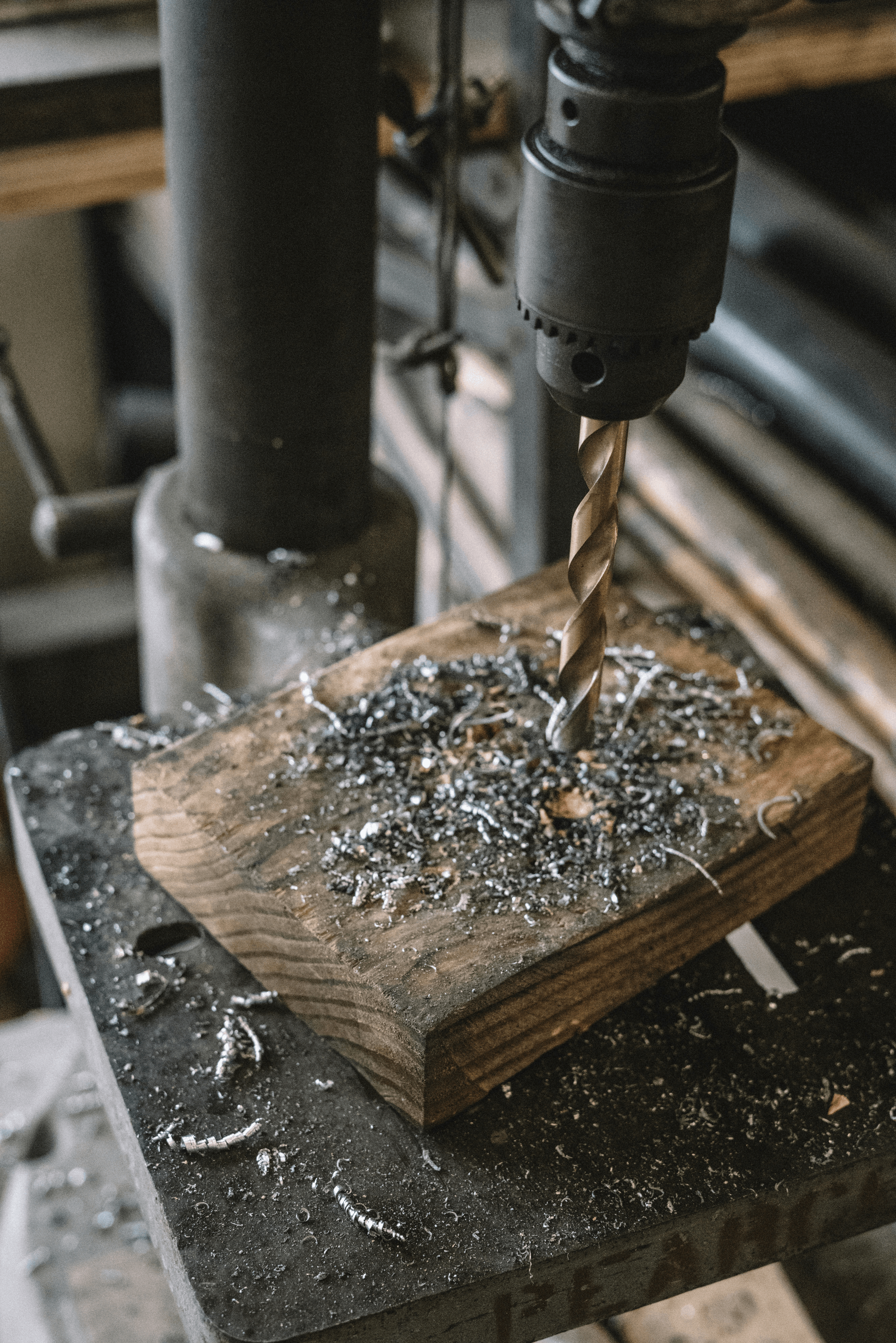 What is the difference between a regular drill and a hammer drill?