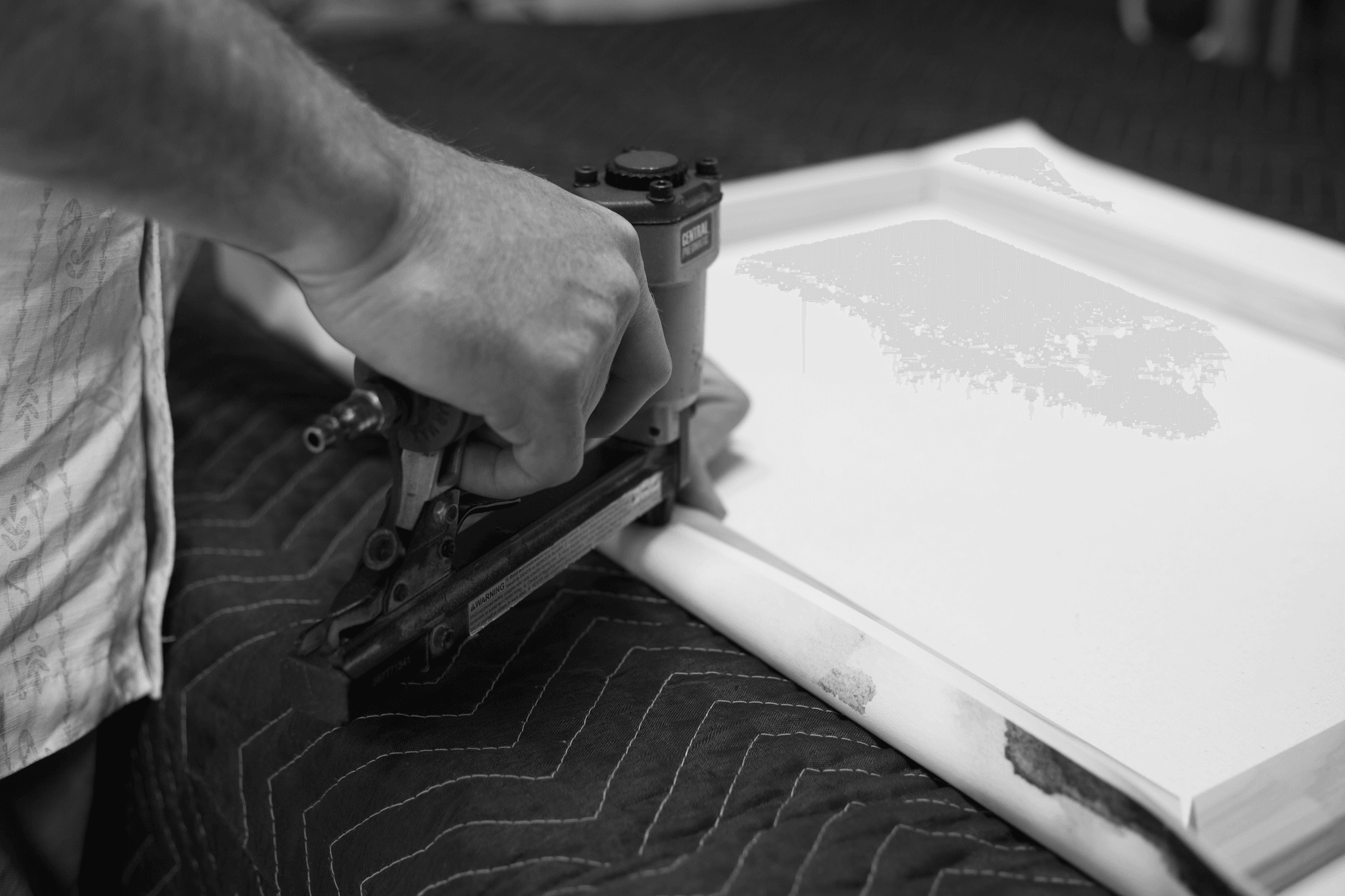 Adhesive polyurethane being used by carpenter