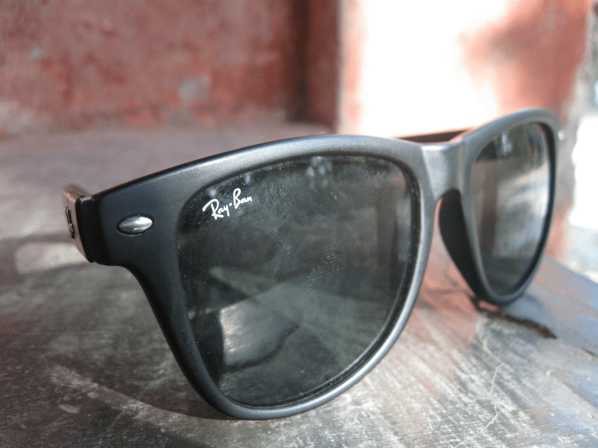 Stylish ai enhanced glasses showcasing dual cameras in bright sunlight.