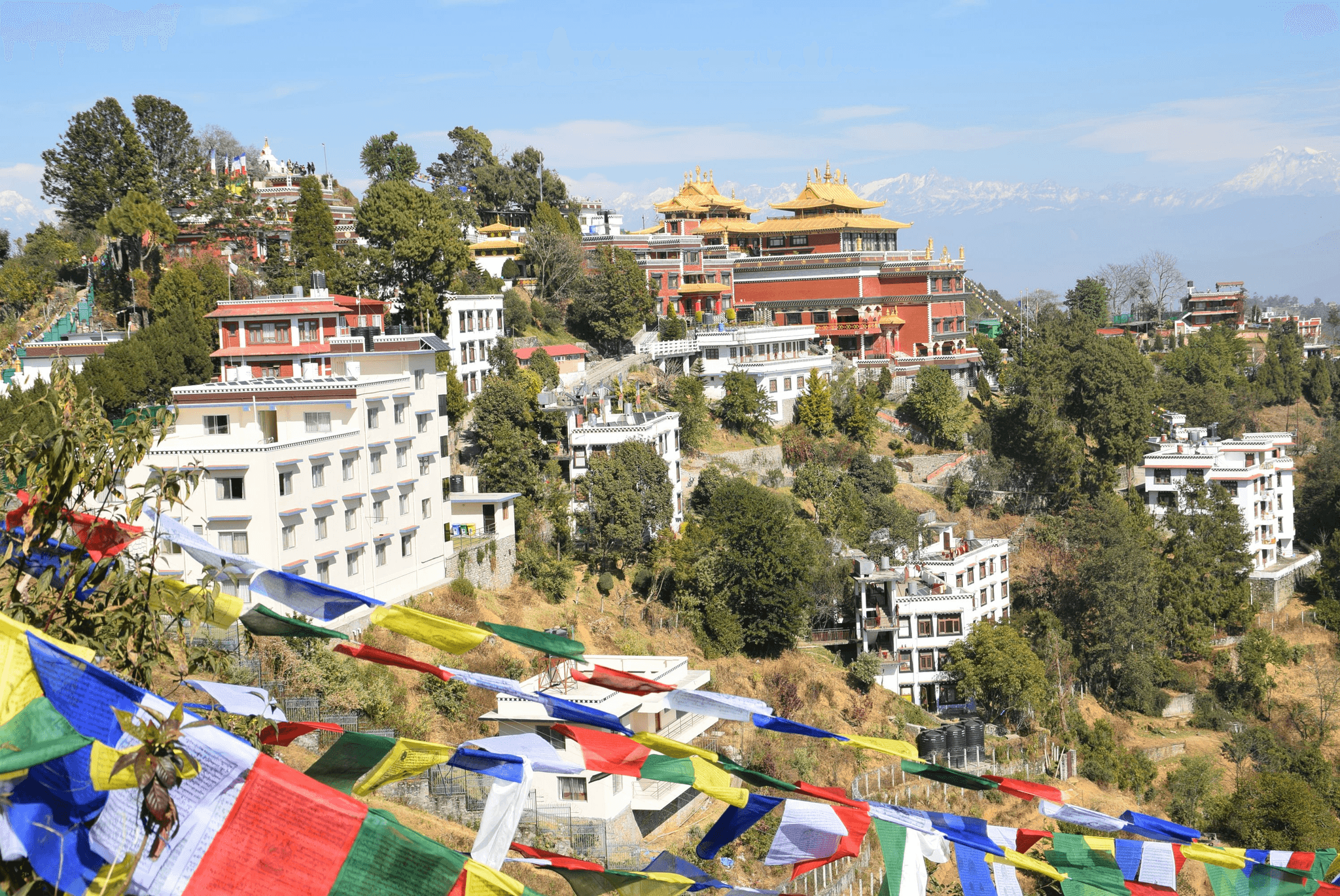 Tibetan Monastery in Snow-Capped Mountains