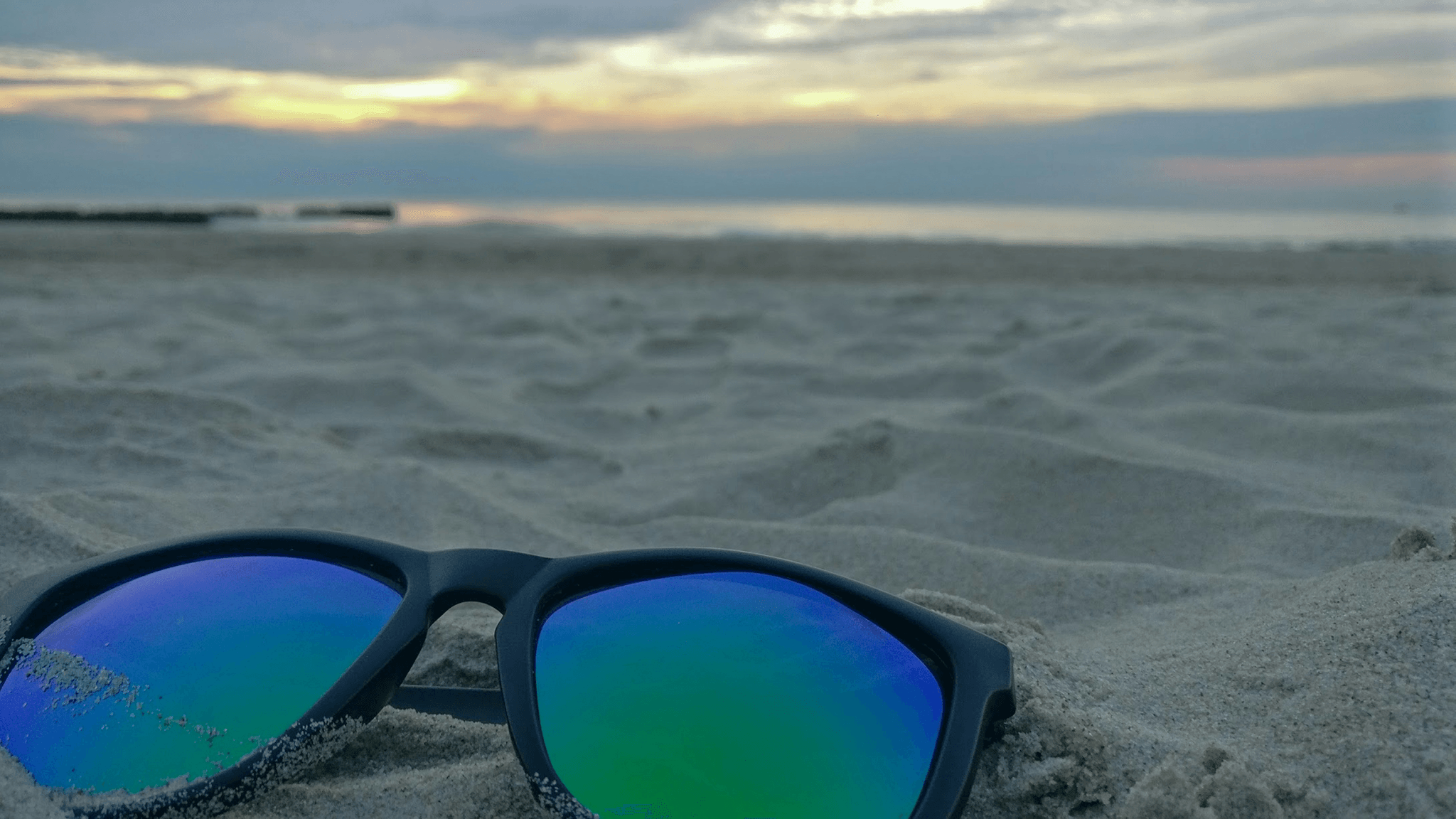 sunglass material lens showcased in trendy mirrored design