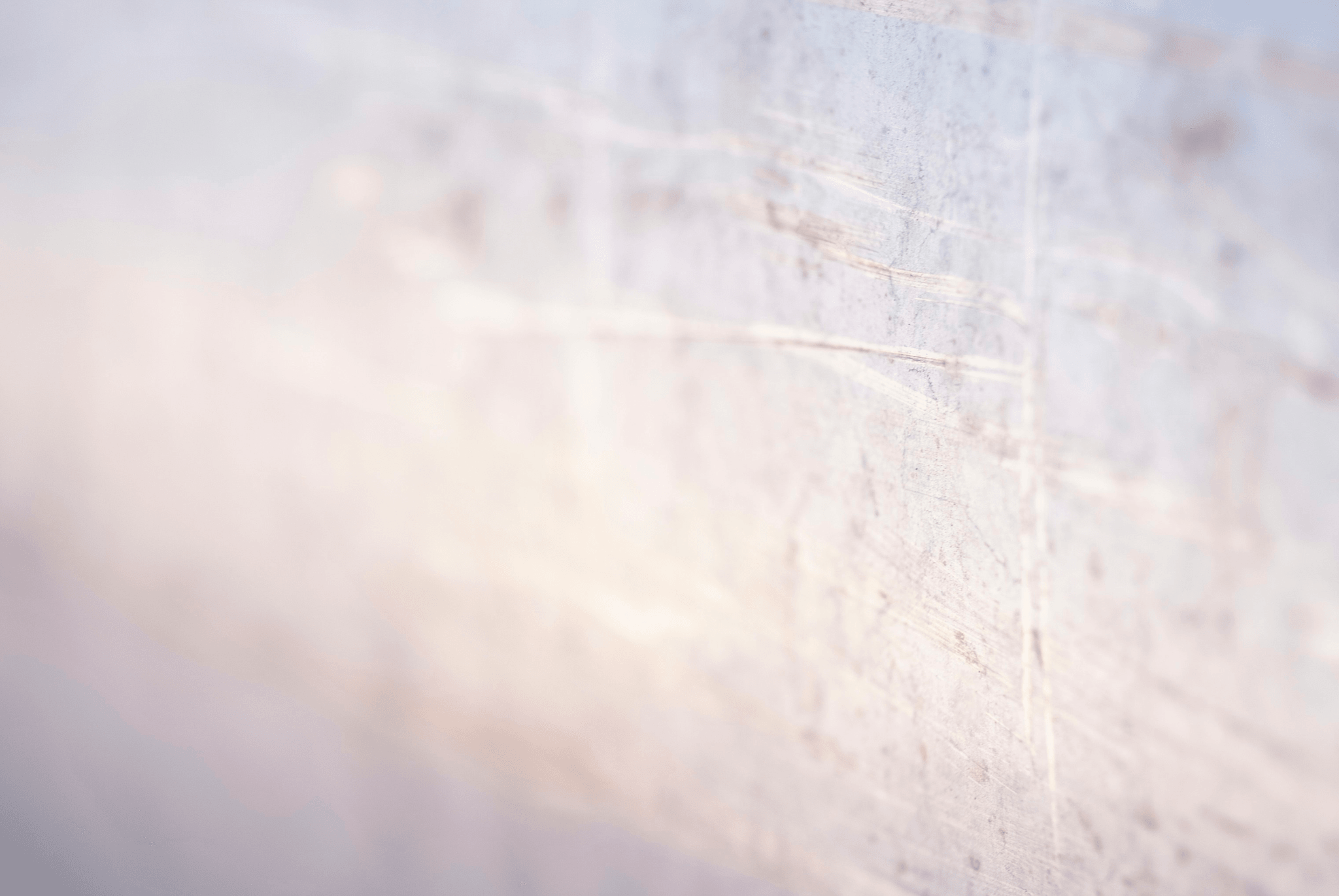 Enhancing wall panels with durable laminating adhesive