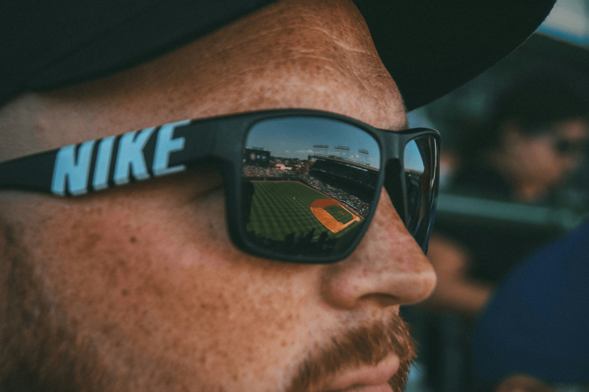 Custom baseball sunglasses with logo worn by baseball players