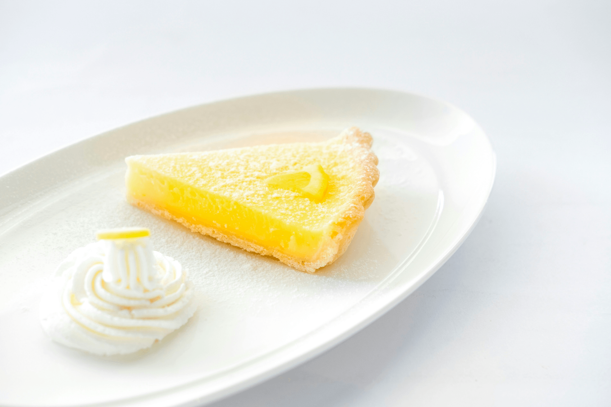 Elegant French Lemon Tart Pie showcasing vibrant filling and flaky crust in this appealing pie recipe.