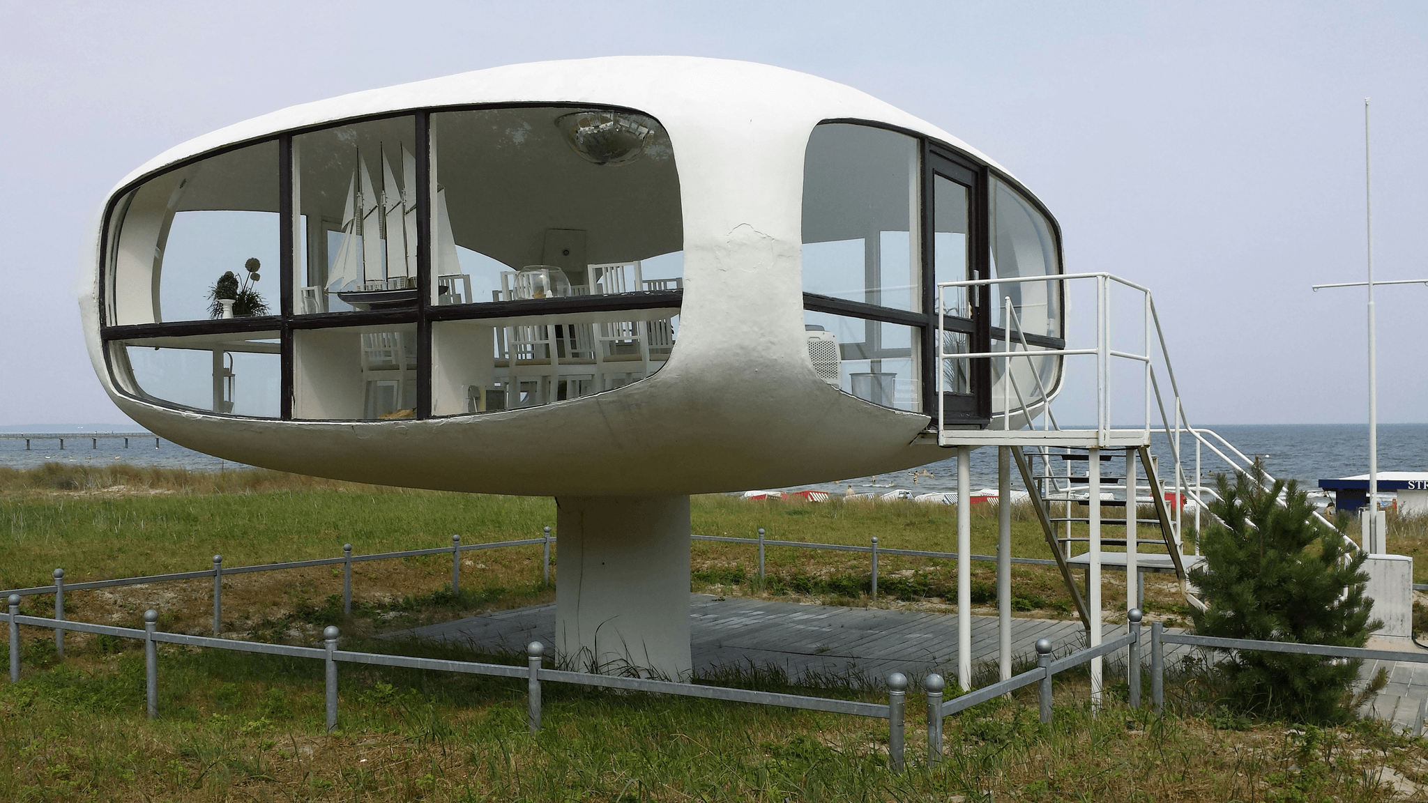 Futuristic space capsule house with solar panels