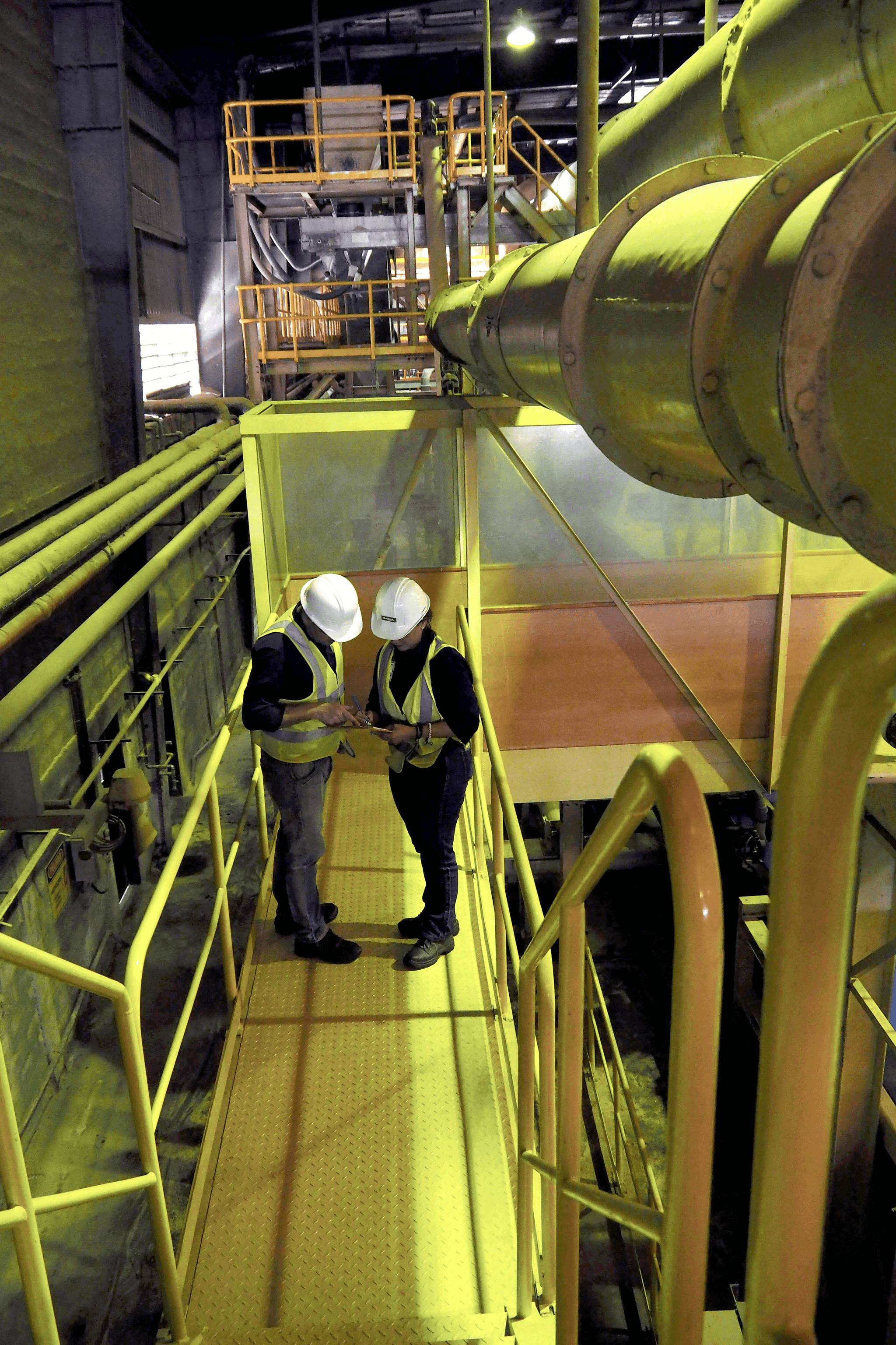 Machinery inspection focusing on emergency stops and safety features.