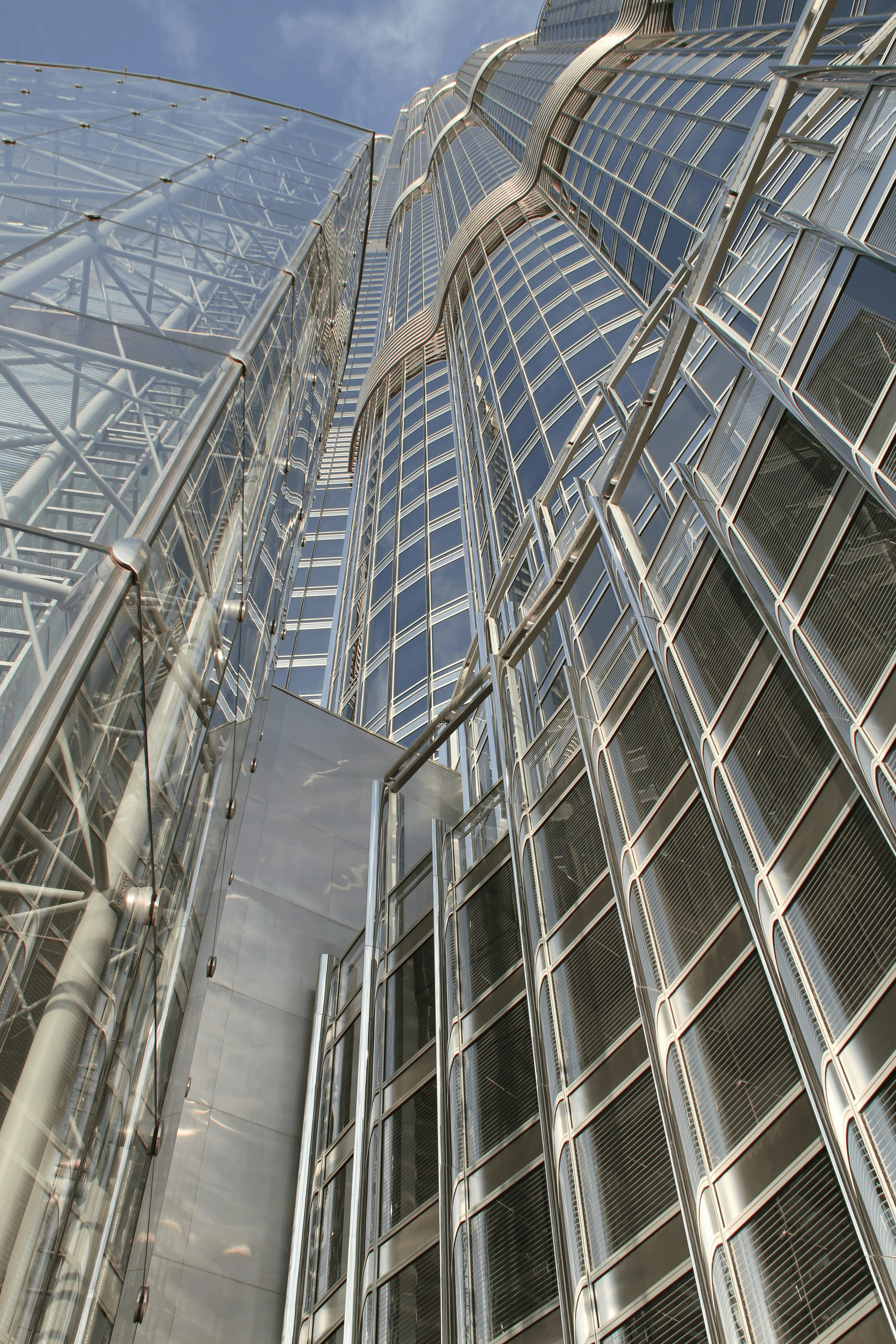 Modern urban setting showcasing efficient use of space with a traction elevator.