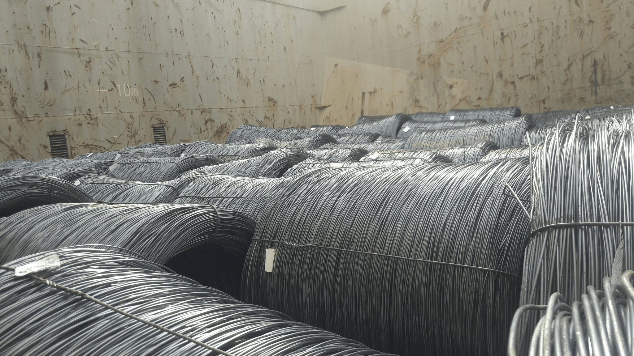 Coiled 16 gauge galvanized steel wire showcasing durability and versatility.