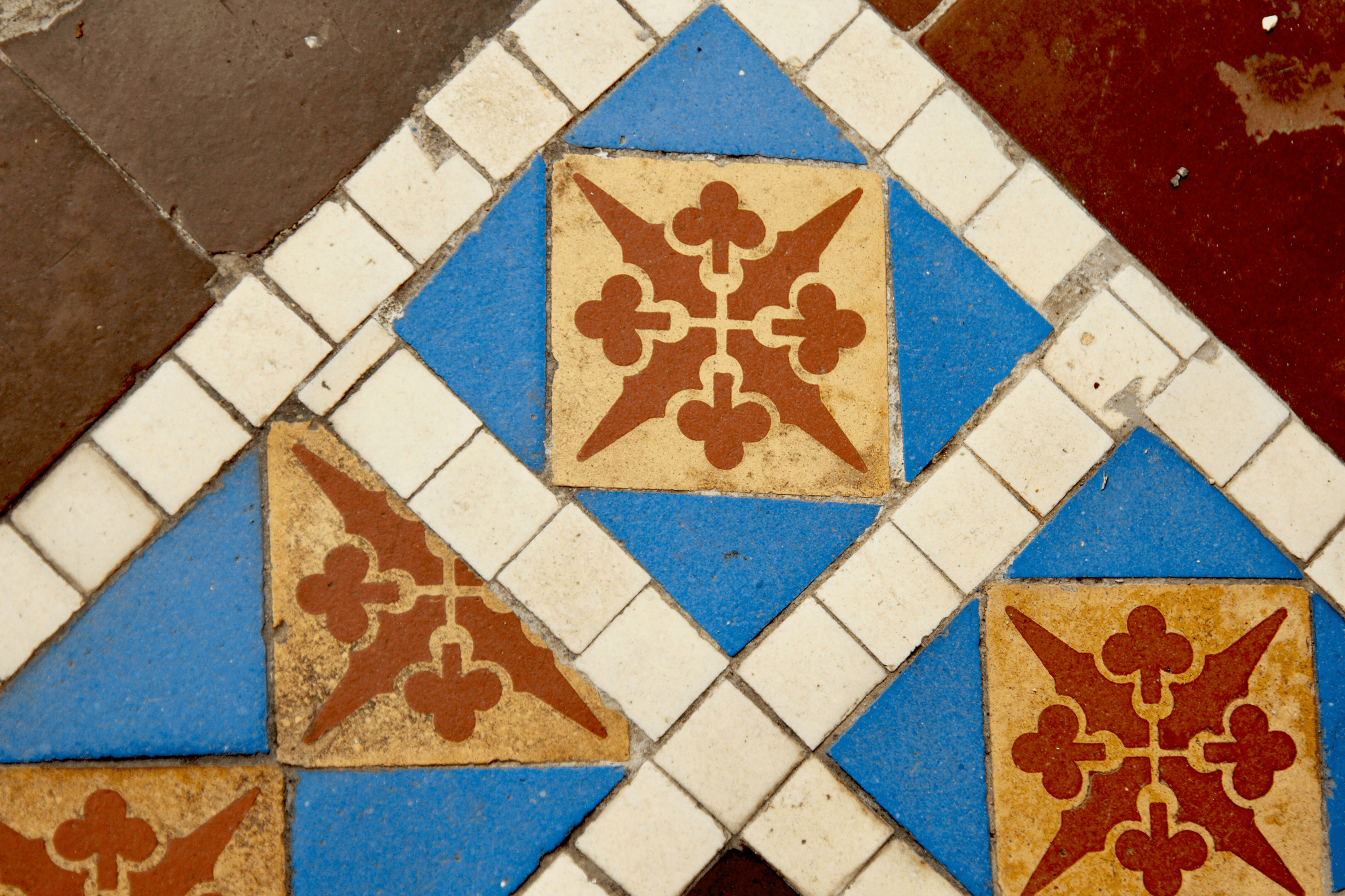 Various designs of ceramic tile flooring representing different types of tile flooring