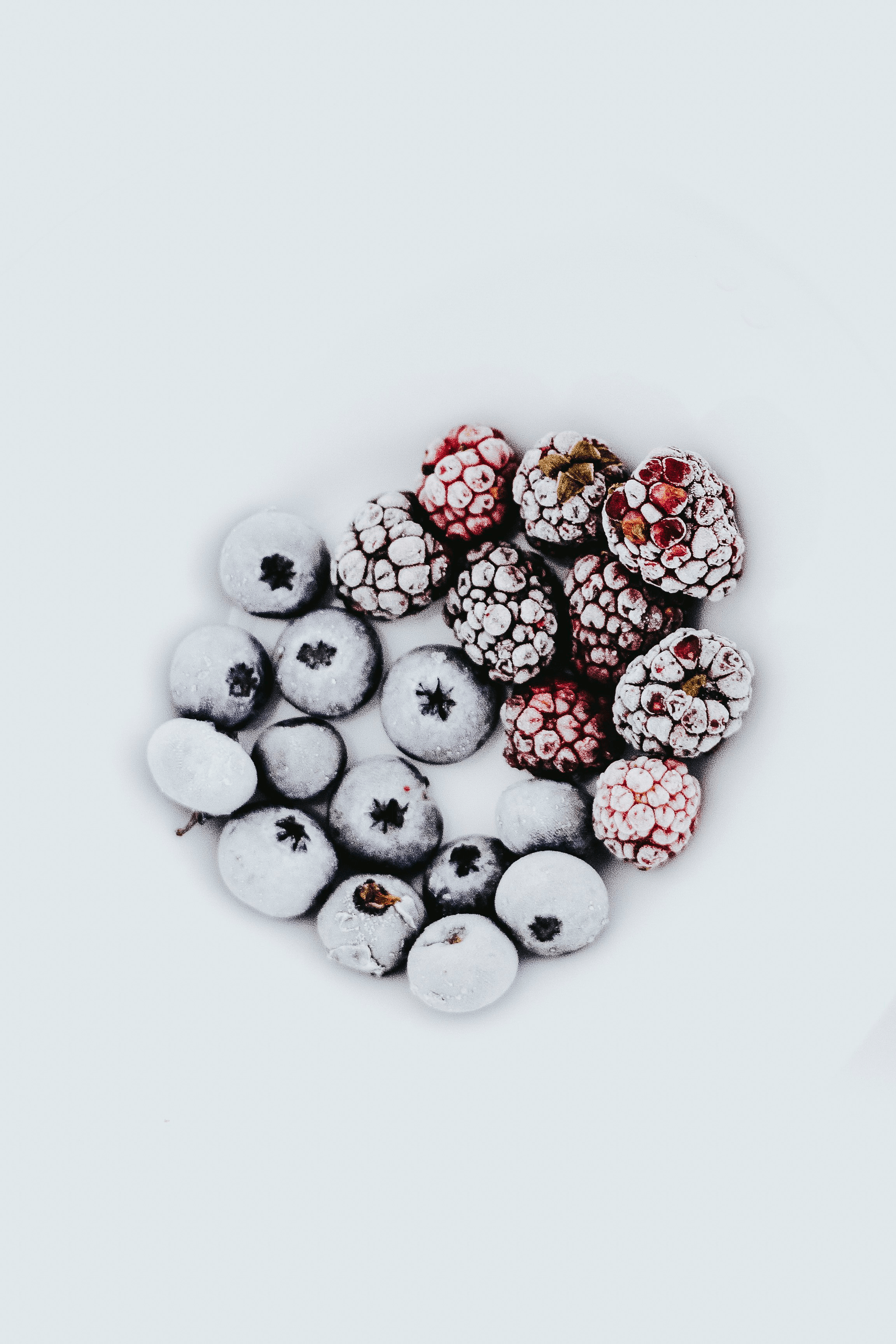 Delicious blackberry freeze dried fruits displayed on wooden shelf.