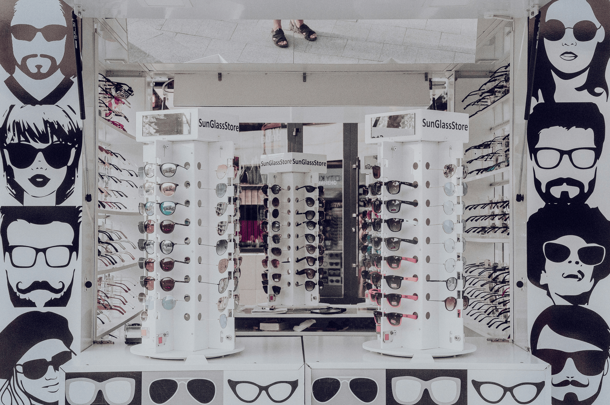 best frames for strong prescription being tried on by a customer