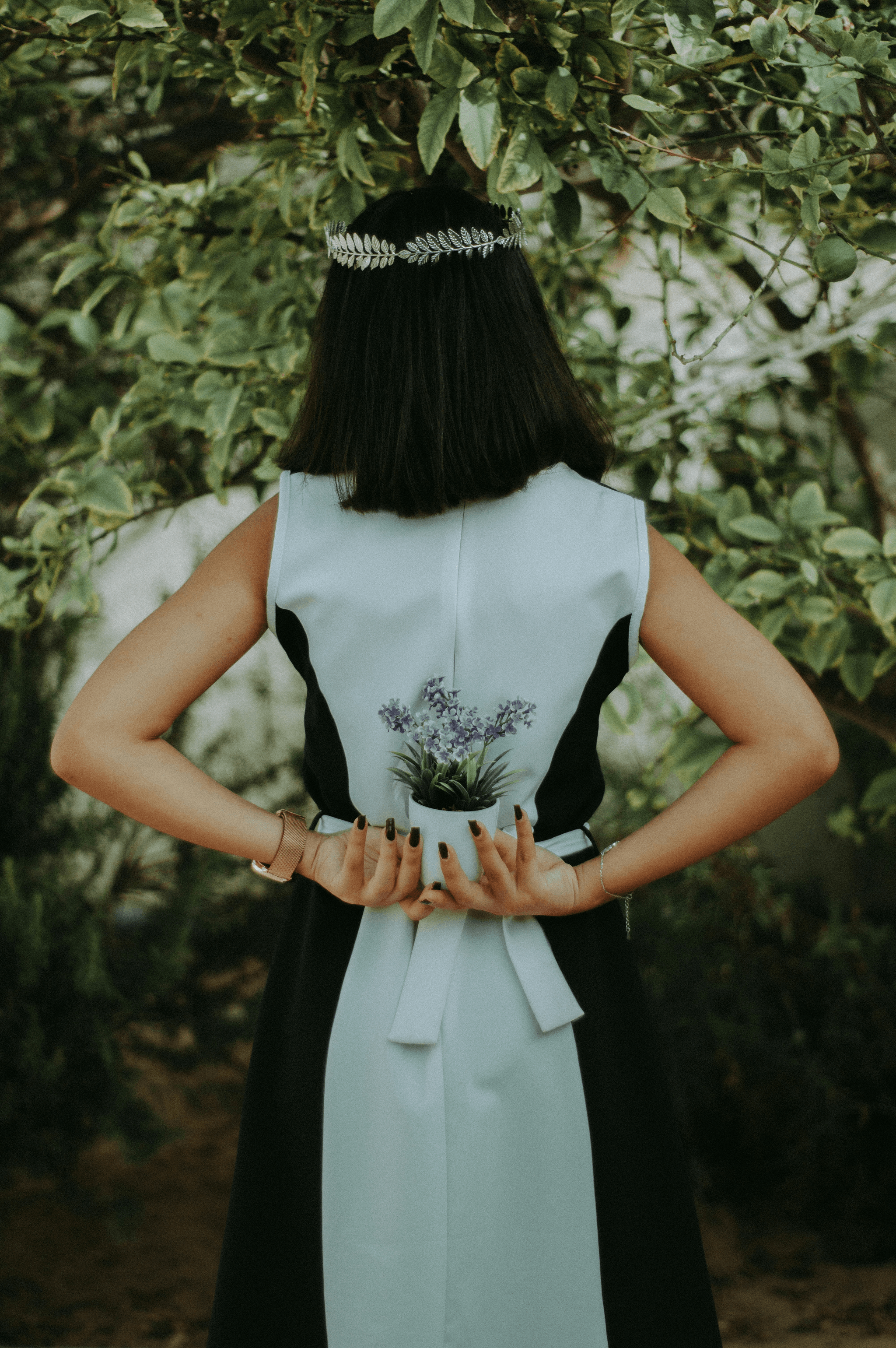 Beautiful bridal look featuring floral jewelry including gold flower necklace