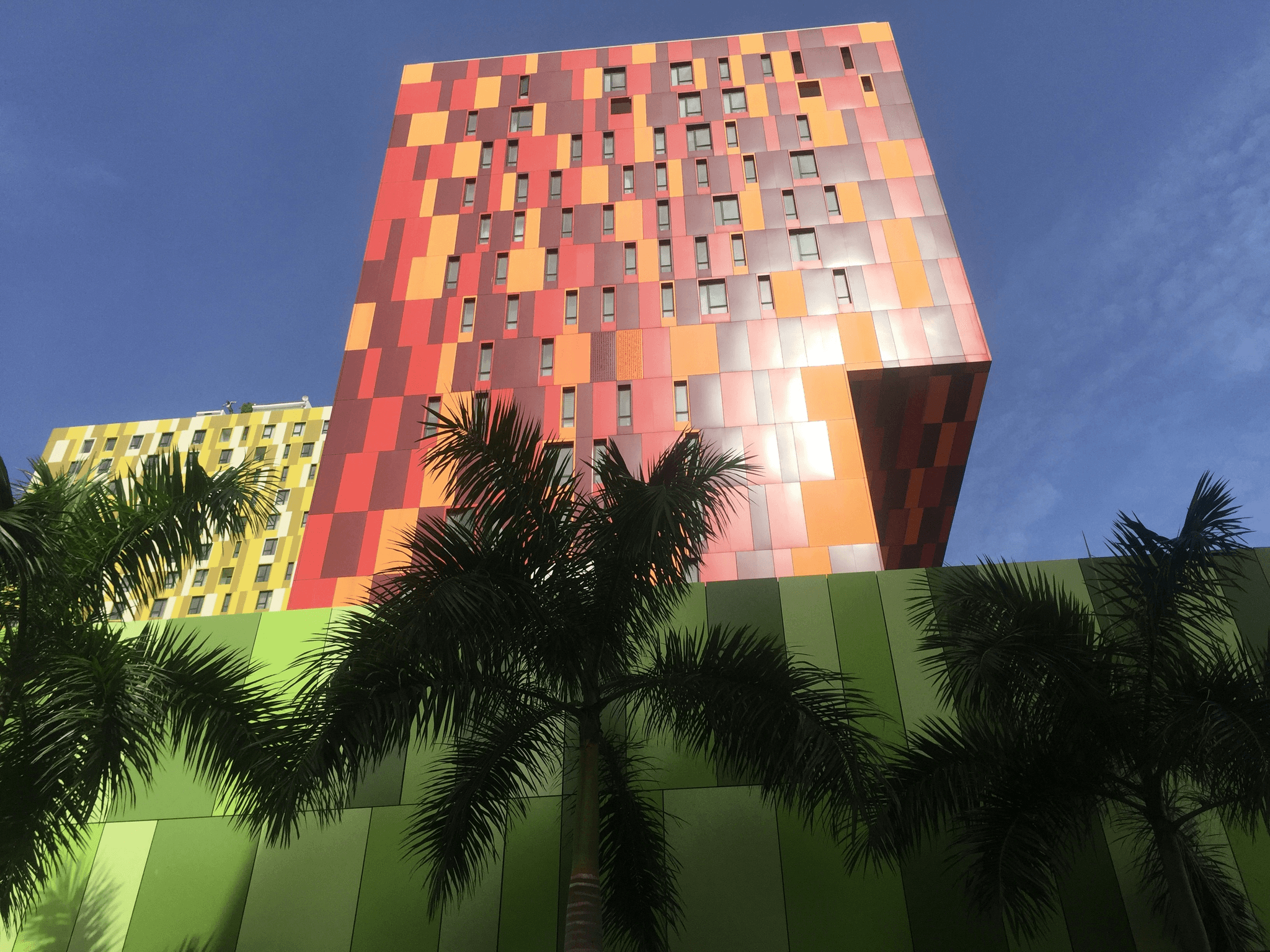 prefab hotel exterior featuring modern design and lush surroundings