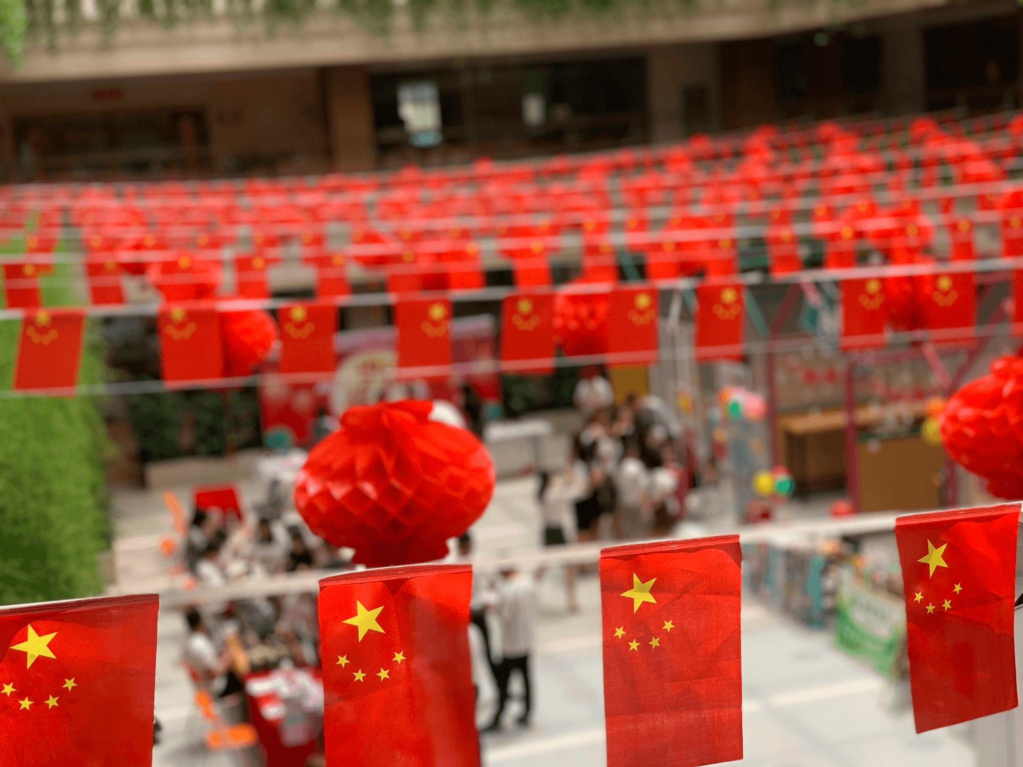 Chinese dragon dance performance in city square.