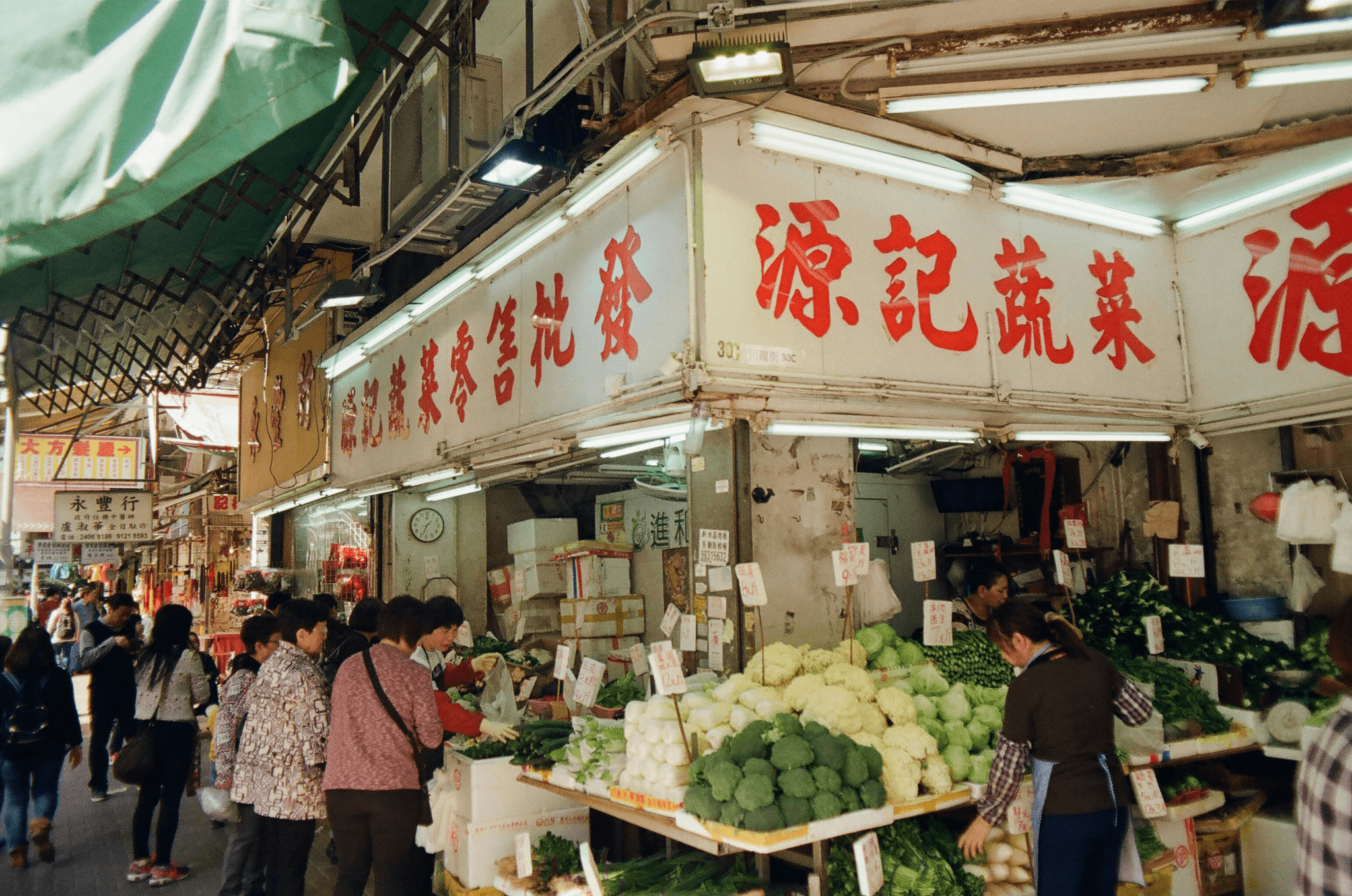 Exploring flavors at guangzhou market with friendly vendors