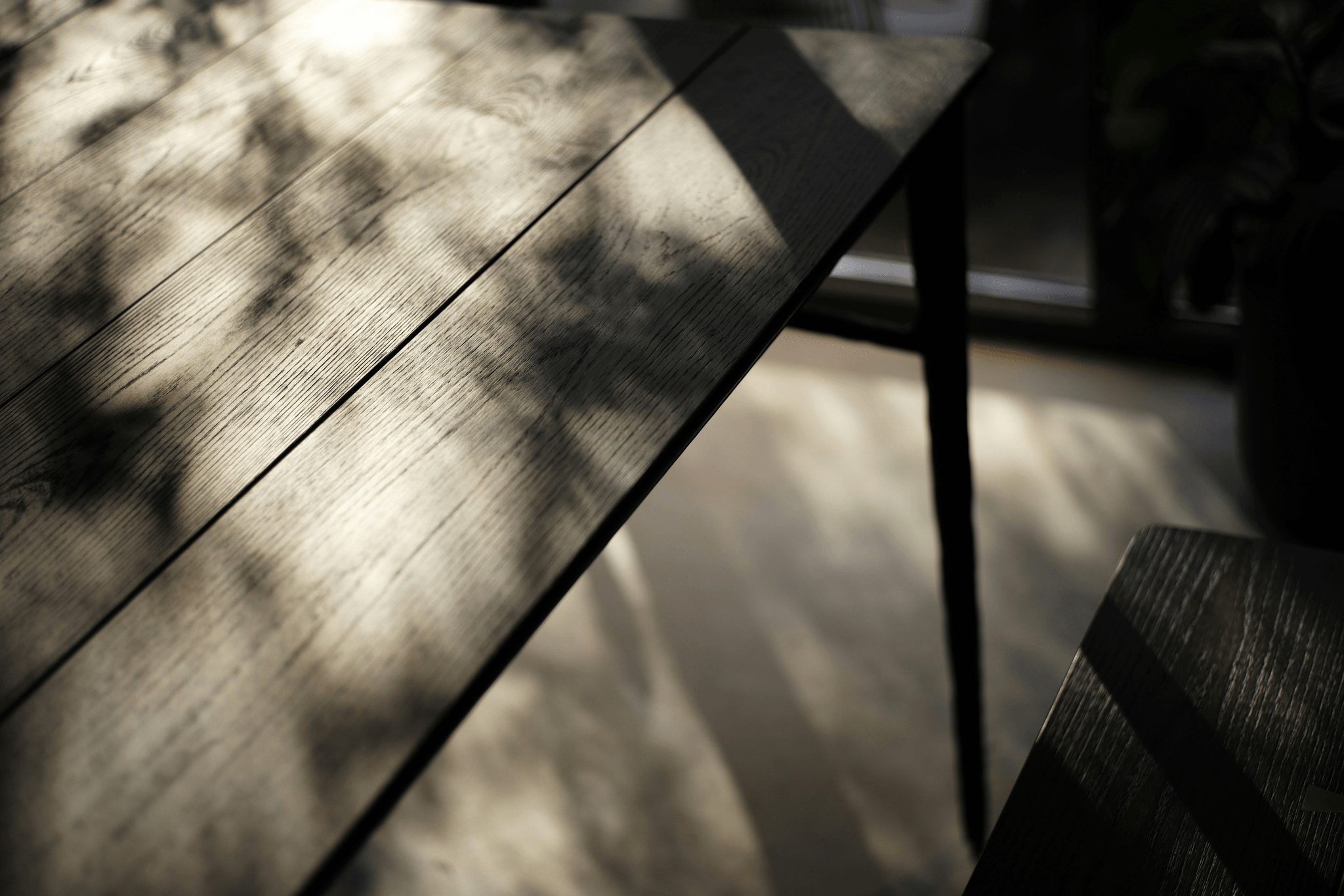 Outdoor furniture finished with gloss lacquer.