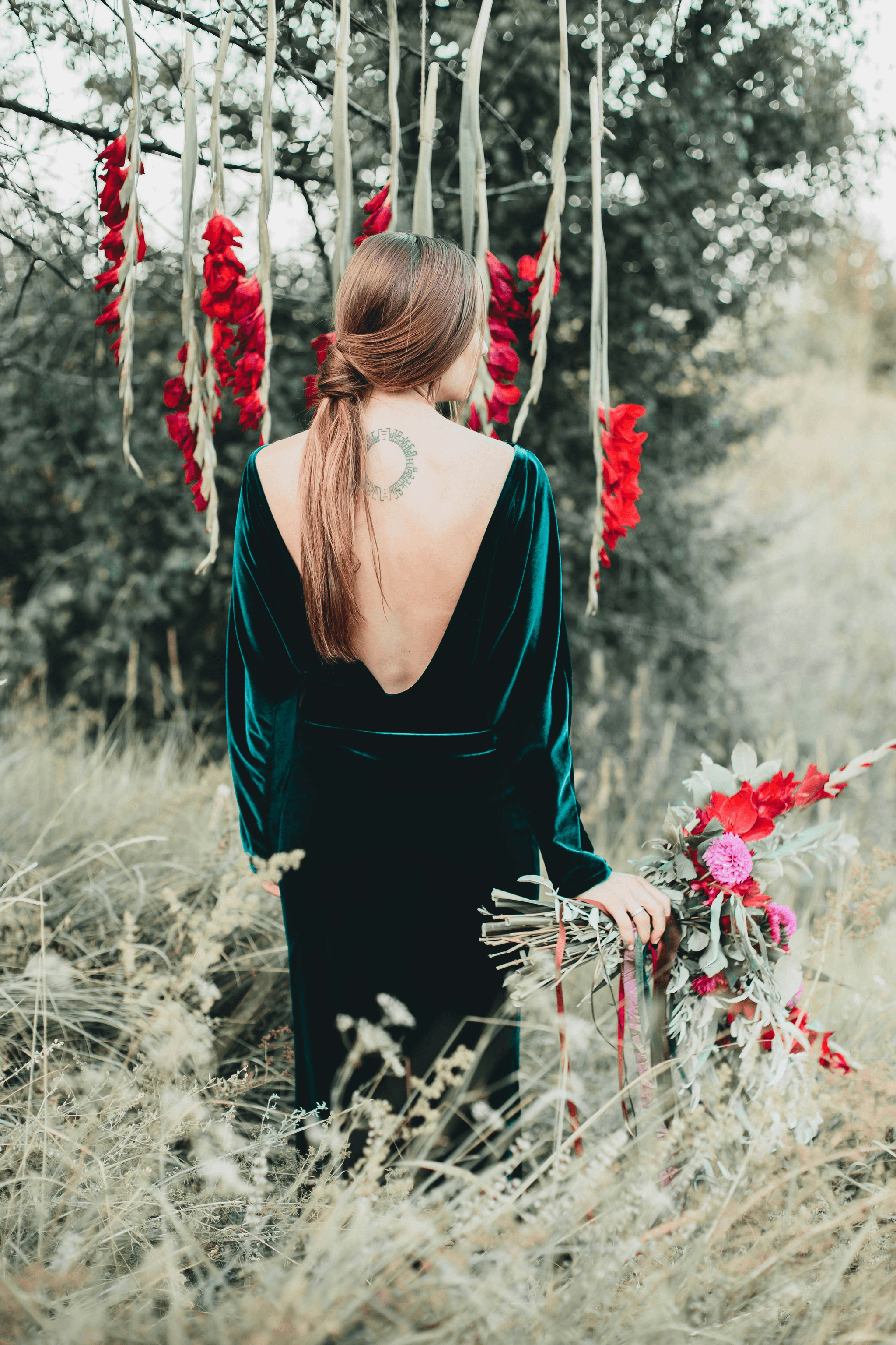 Brooch on dress enhances style and elegance.