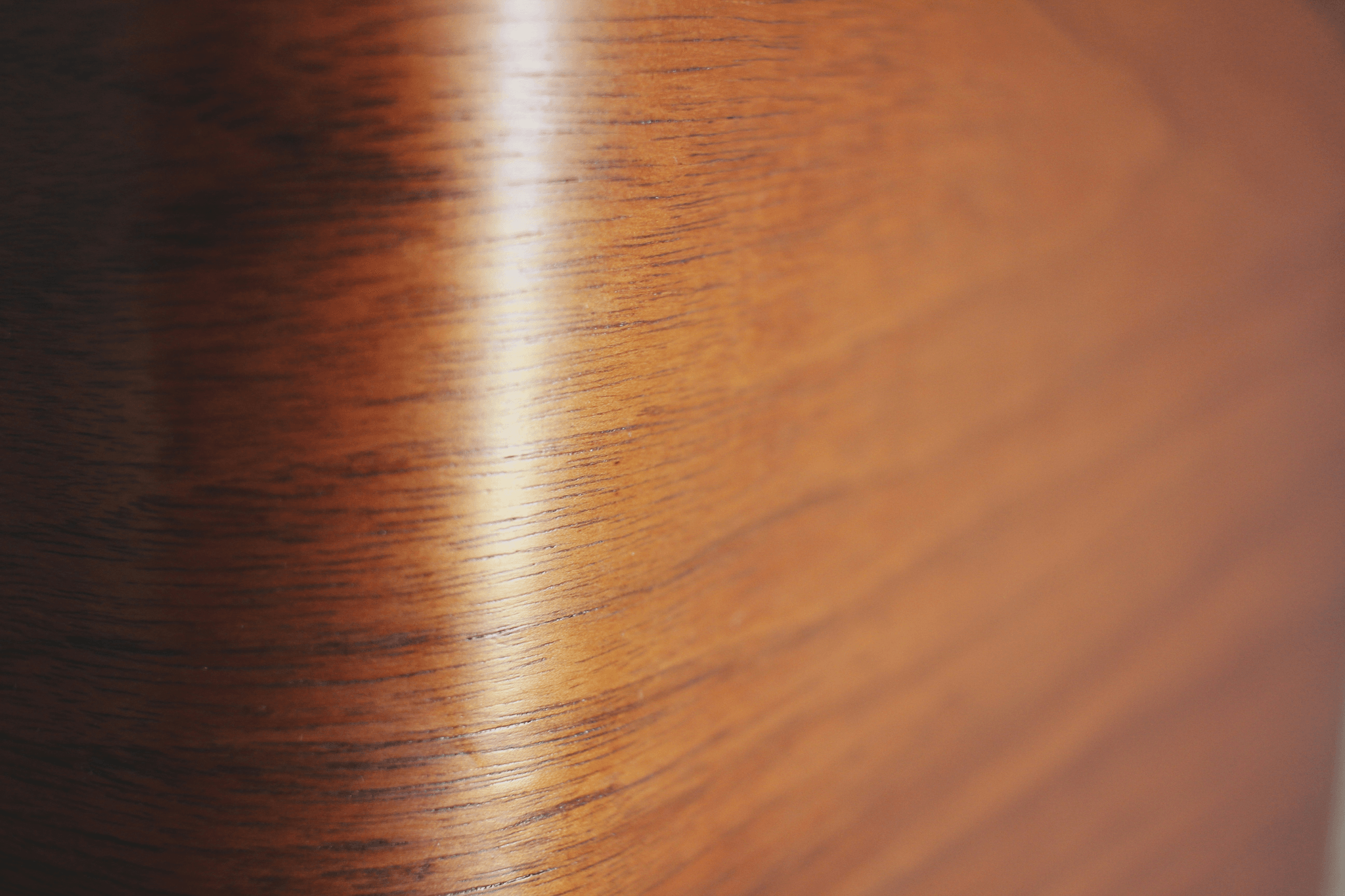 Wooden furniture with glossy finish from water-based gloss lacquer.