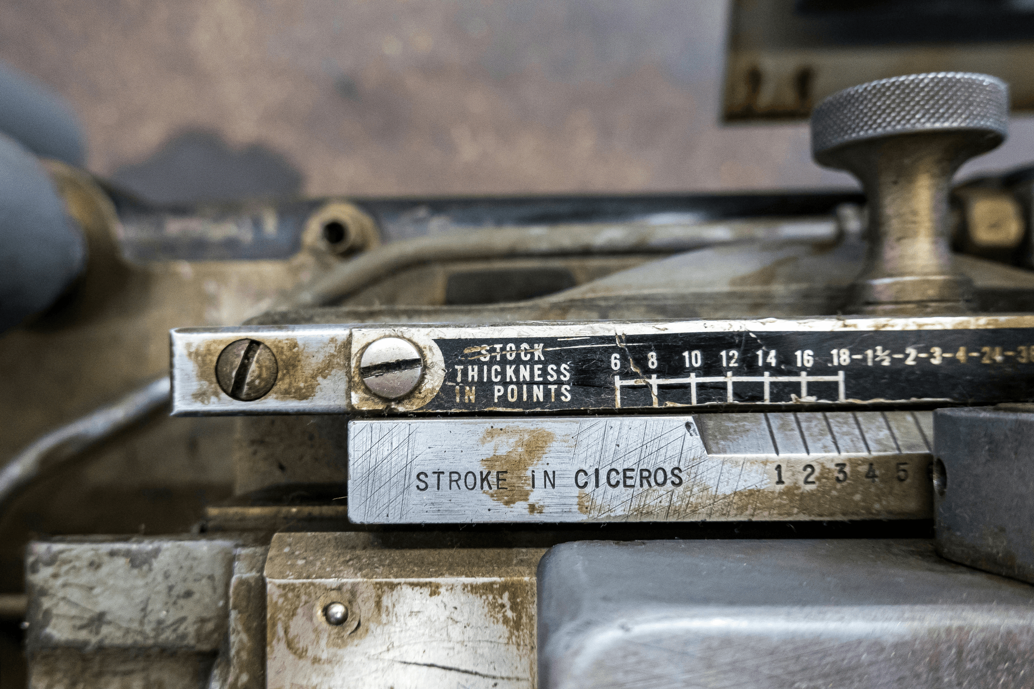 Weld specimen undergoing tensile and bend tests in testing equipment