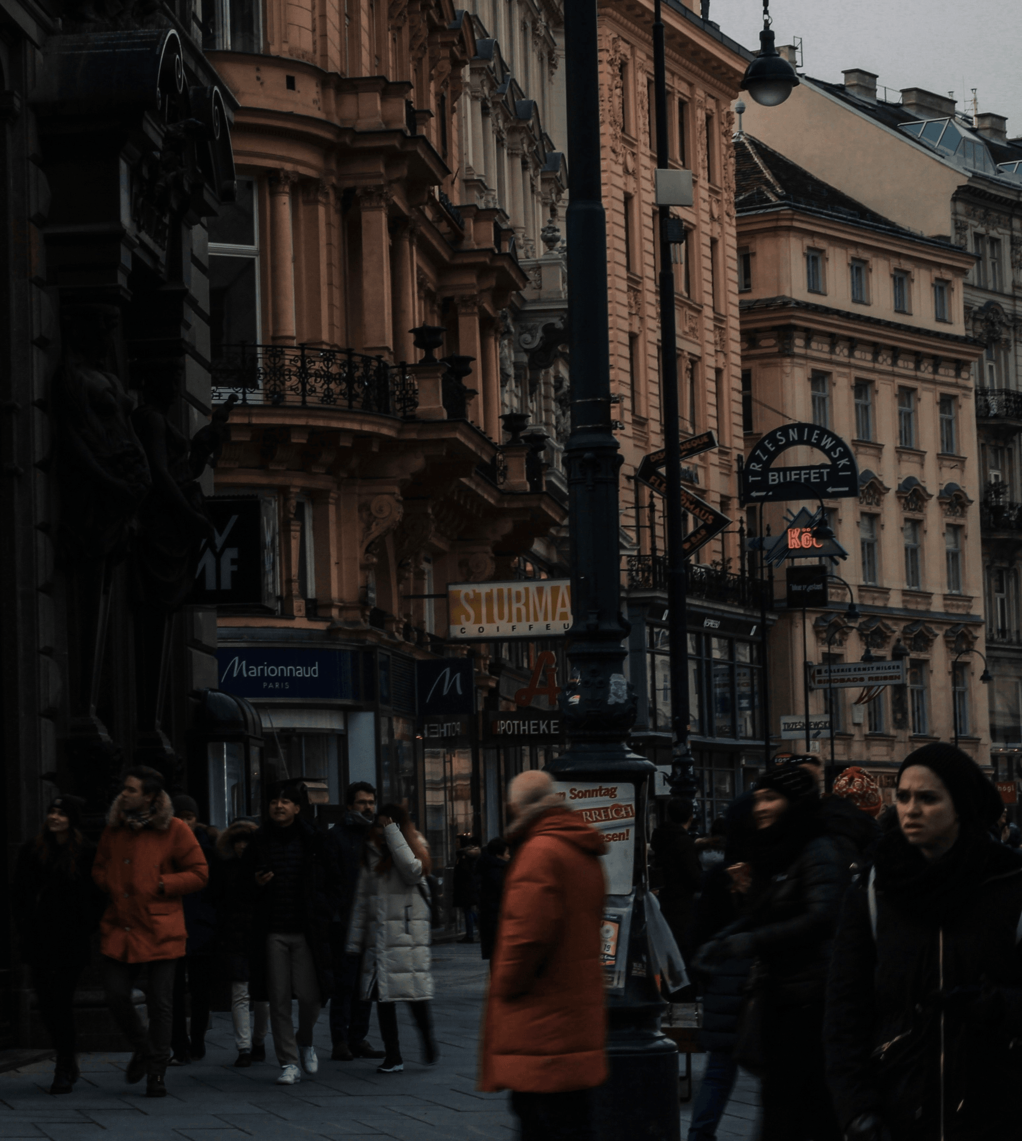 Busy urban street near container coffee shop
