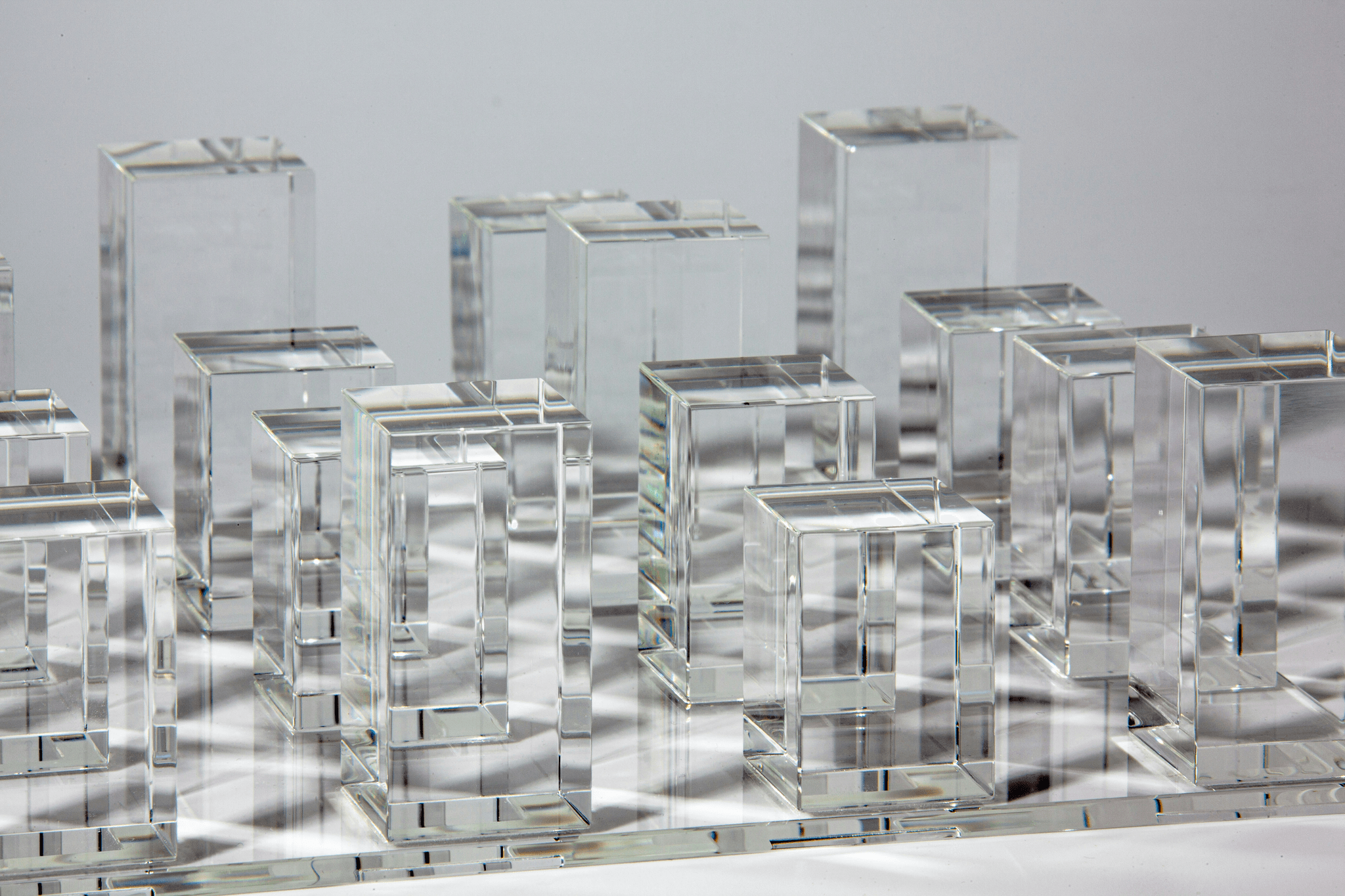 showcase of clear injection molded plastics highlighting design features