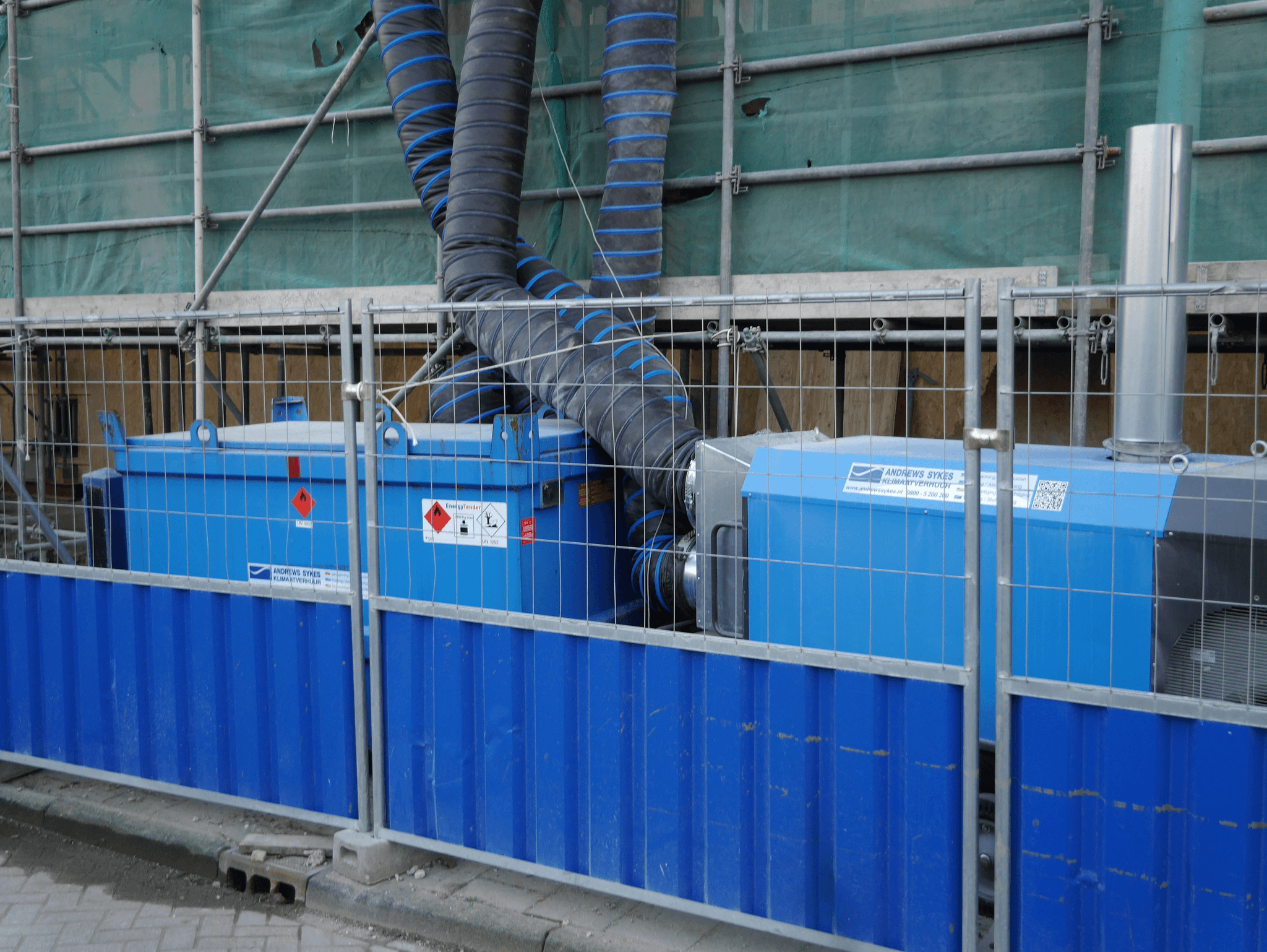 Portable construction toilet options at a busy job site