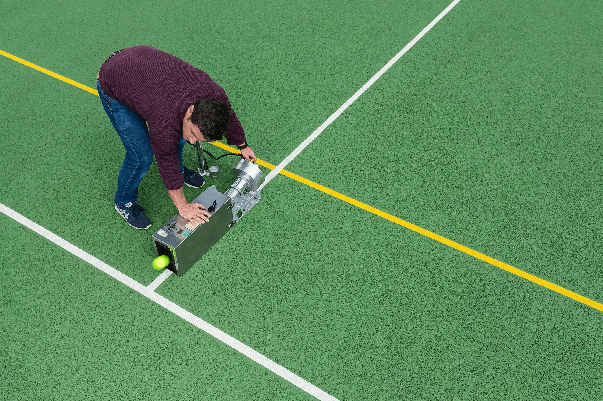 Tennis Ball Inspection shows deformation testing process