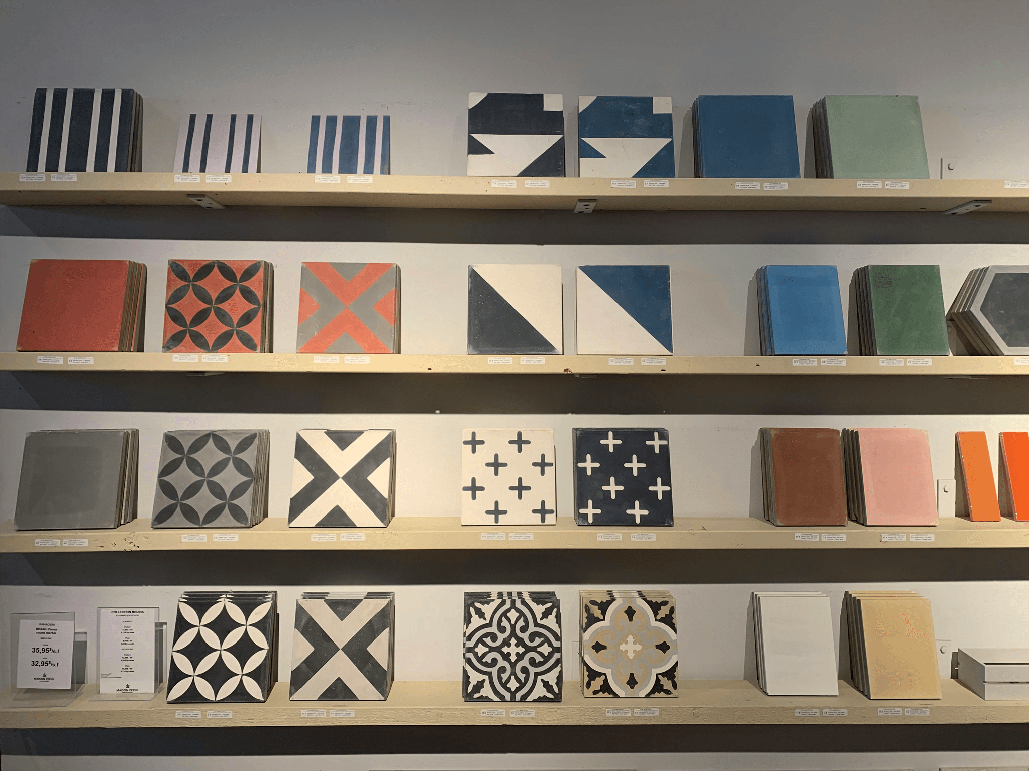 Tile manufacturers showcasing diverse ceramic tile collections