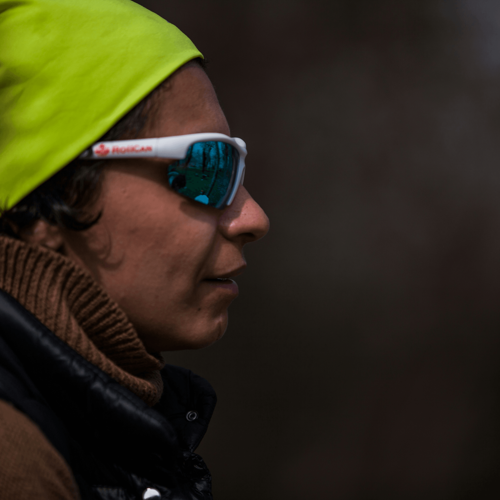 Athletes showcasing oakley running glasses during an outdoor event.