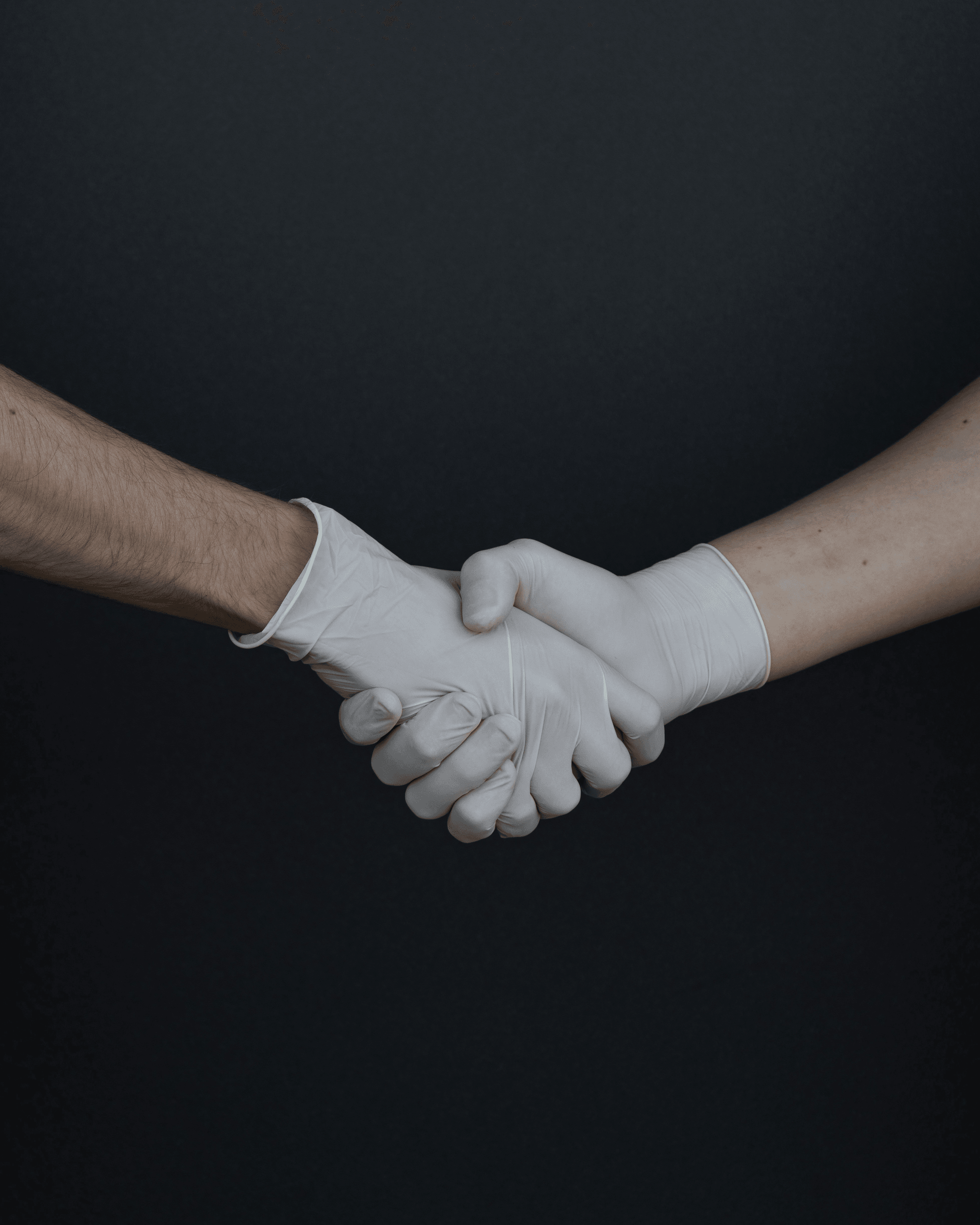 Two individuals shaking hands after requesting a quote