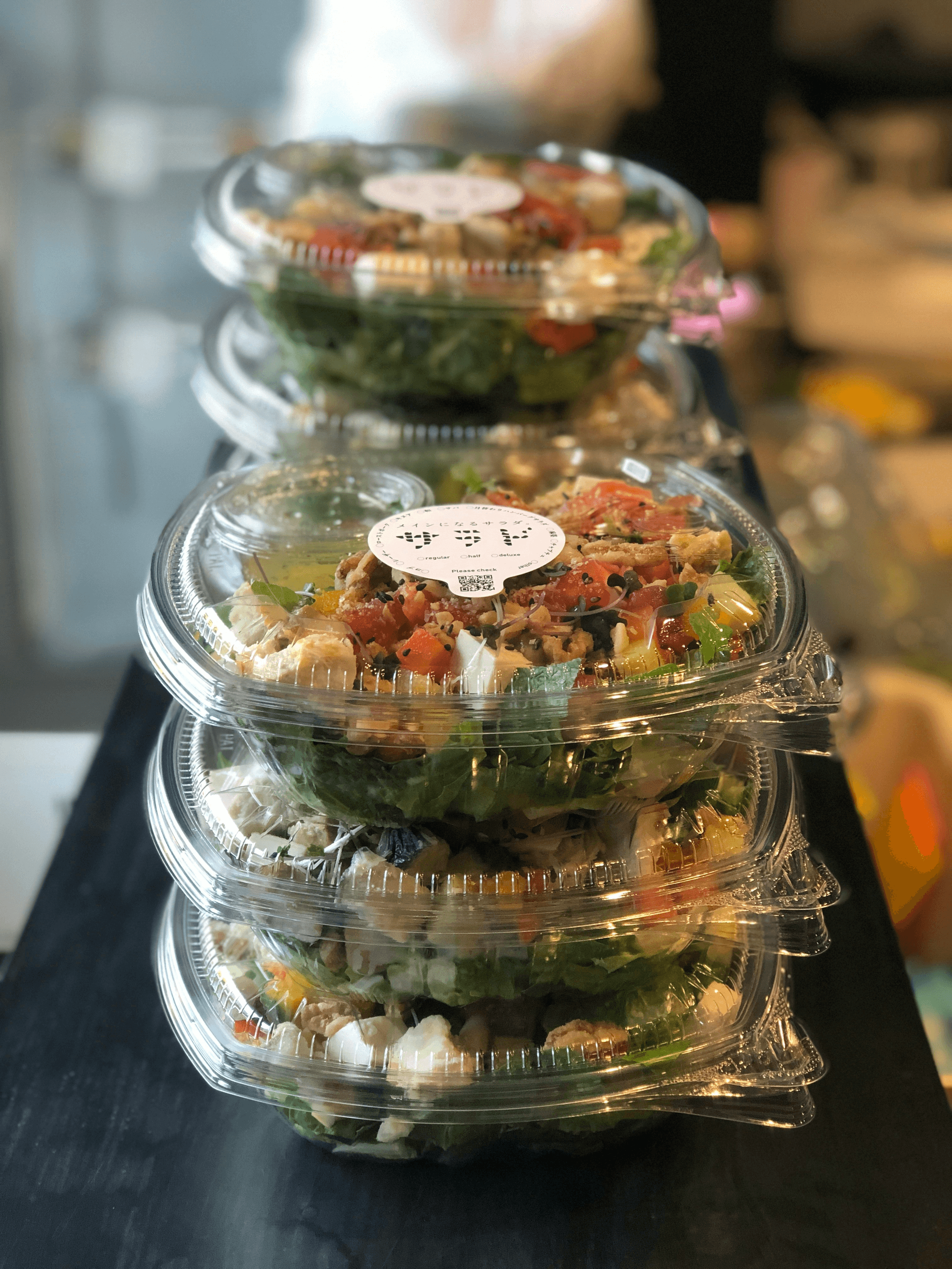 carry out container showcasing fresh salad ingredients