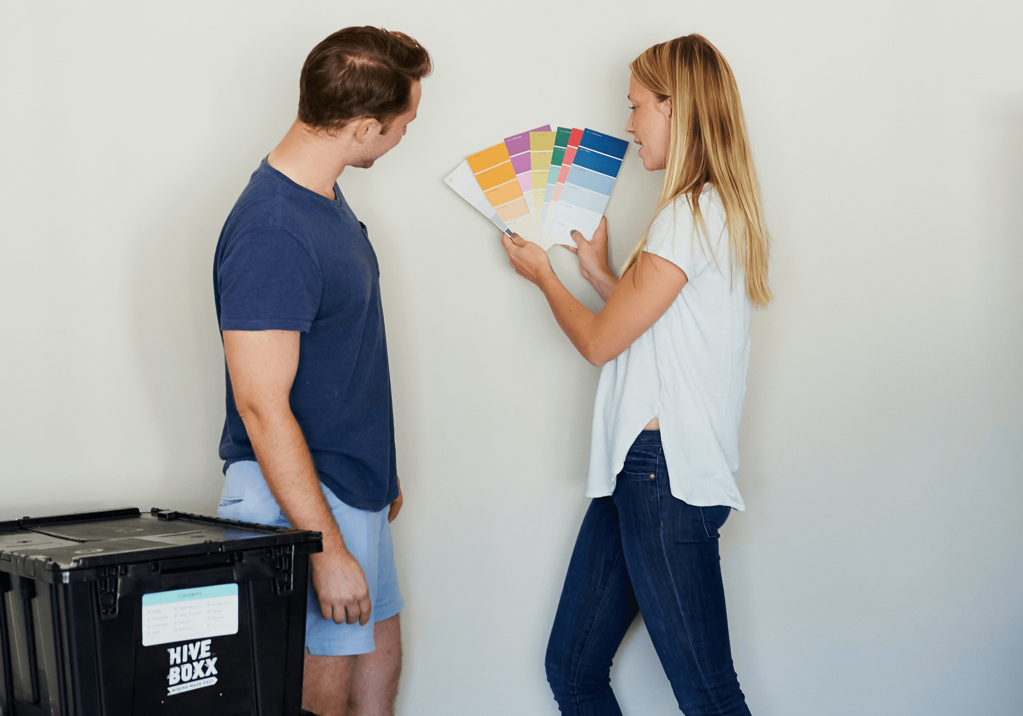 home decorate - interior designer helping homeowner choose paint colors