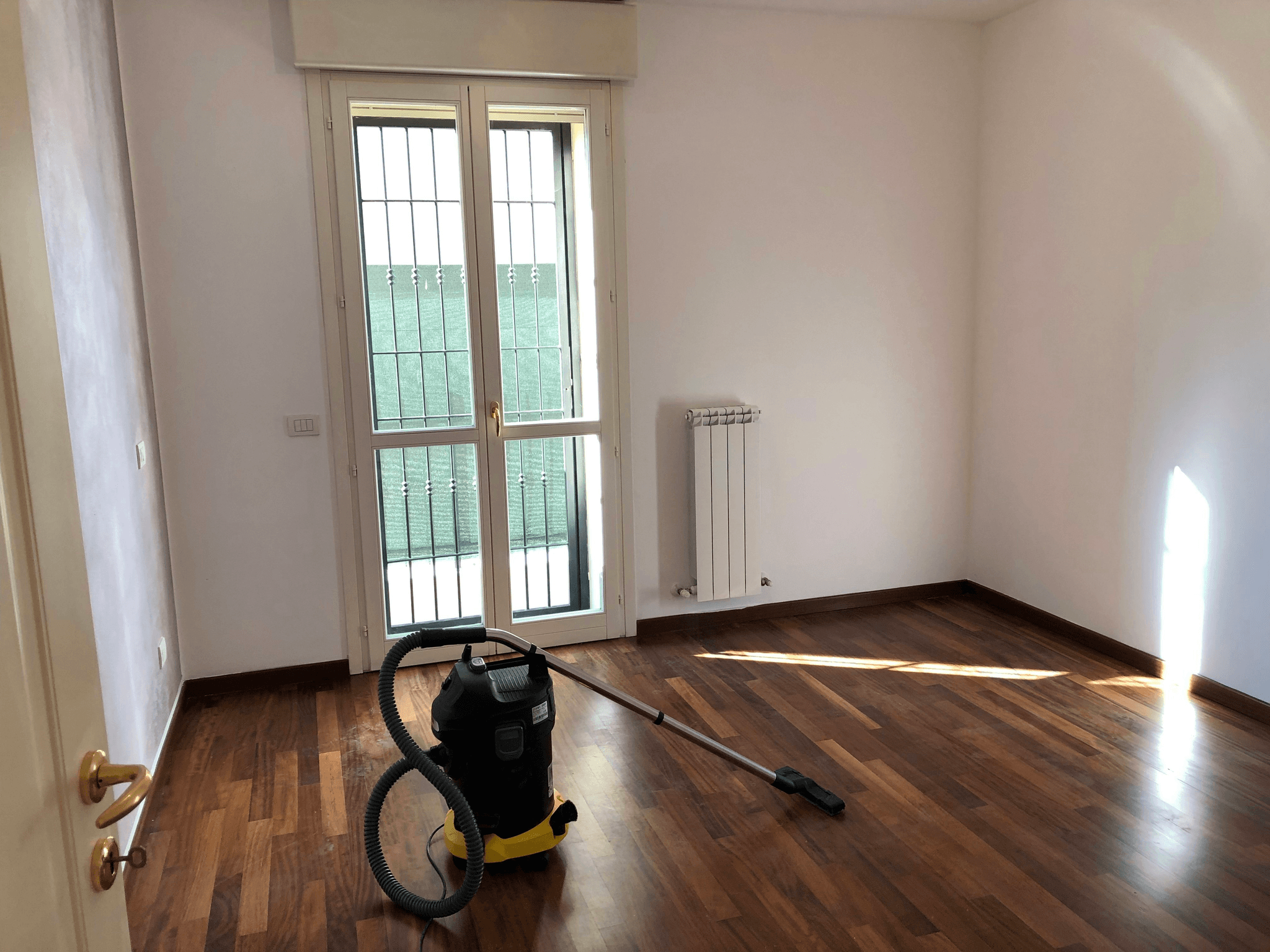 Maintaining Low-Maintenance Wood Flooring with daily sweeping