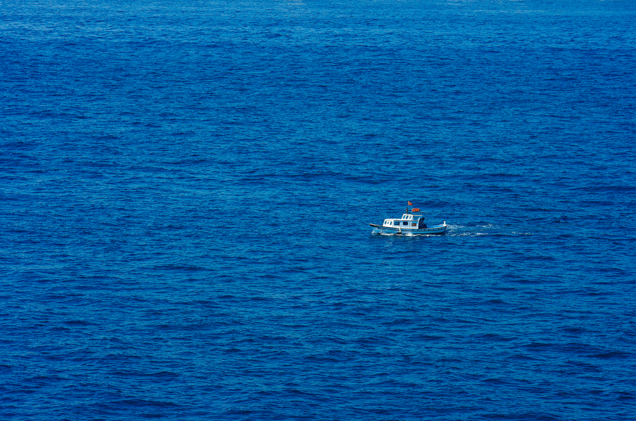 Best Offshore Fishing Boats - Small Fishing Boat on Open Water